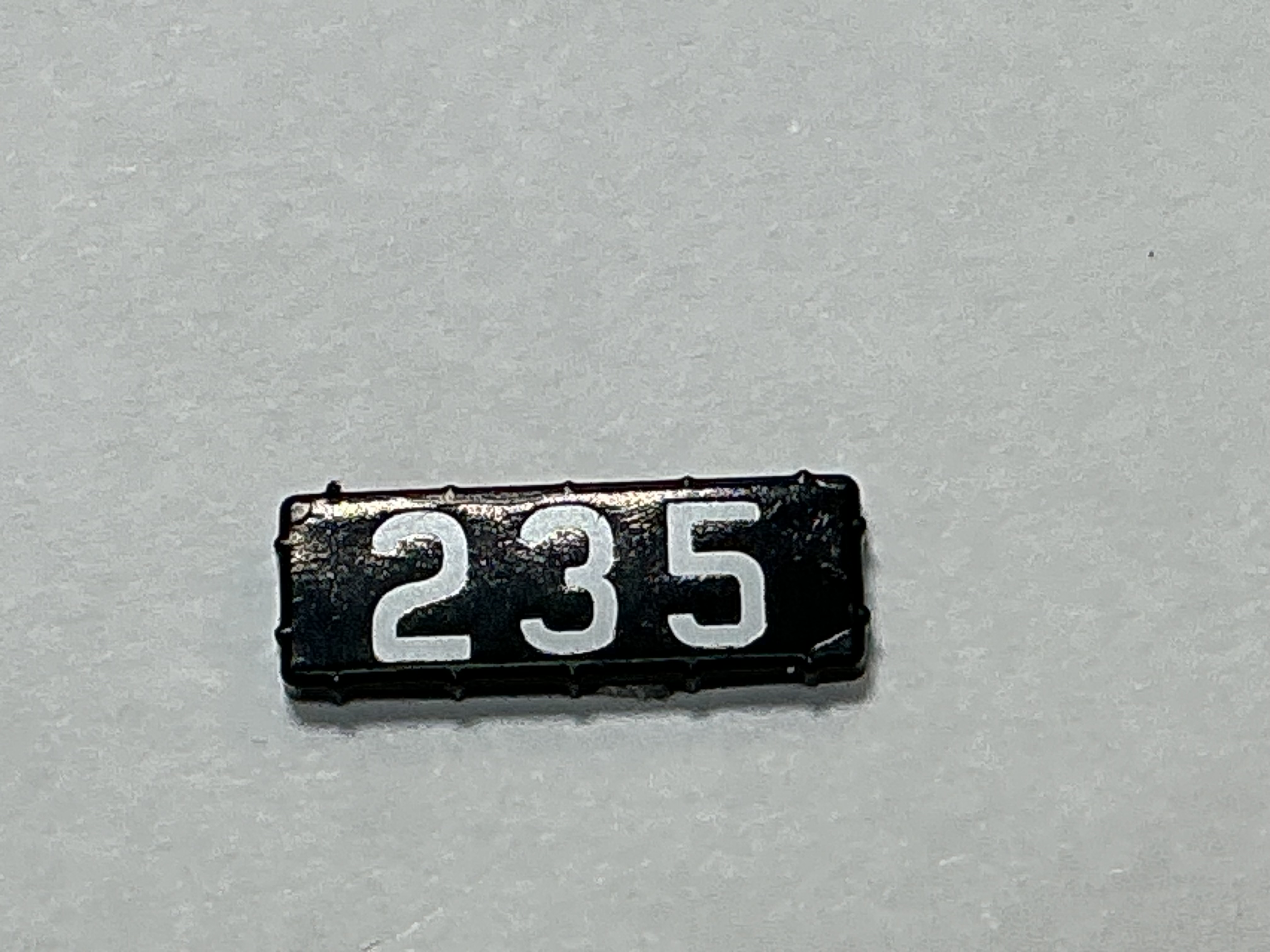 NUMBER BOARD / RH OR LH / FRONT OR REAR / #235 / PREMIER GP-40