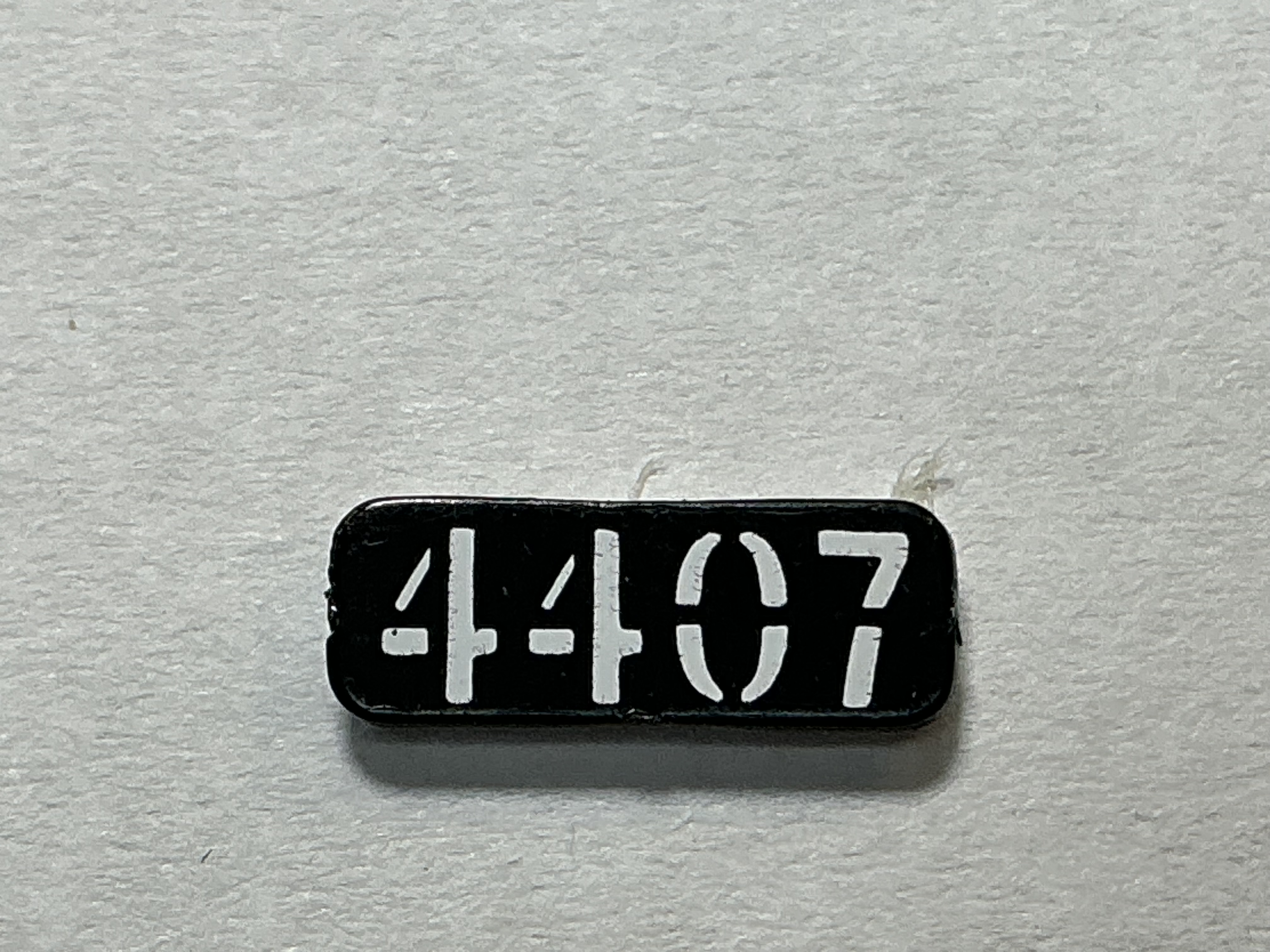 NUMBER BOARD / RH OR LH / FRONT OR REAR / #4407 / PREMIER GP-40