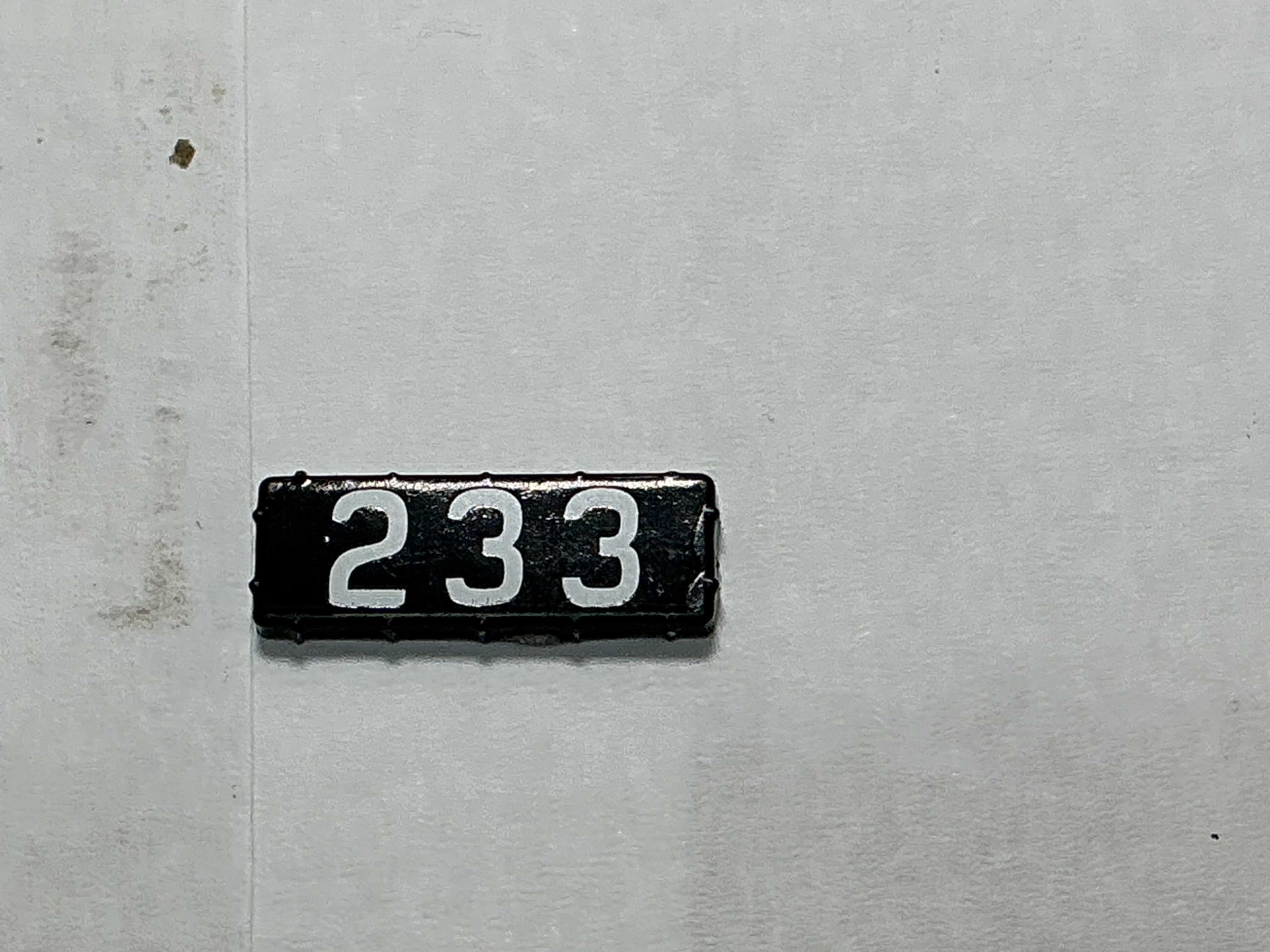 NUMBER BOARD / RH OR LH / FRONT OR REAR / #233 / PREMIER GP-40