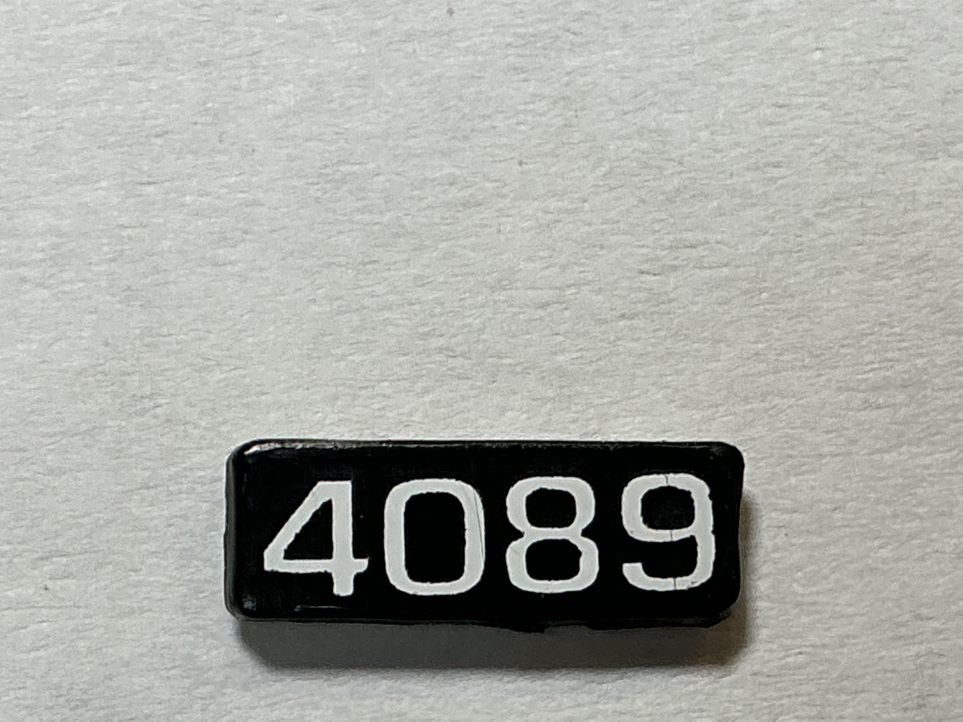 NUMBER BOARD / RH OR LH / FRONT OR REAR / #4089 / PREMIER GP-40