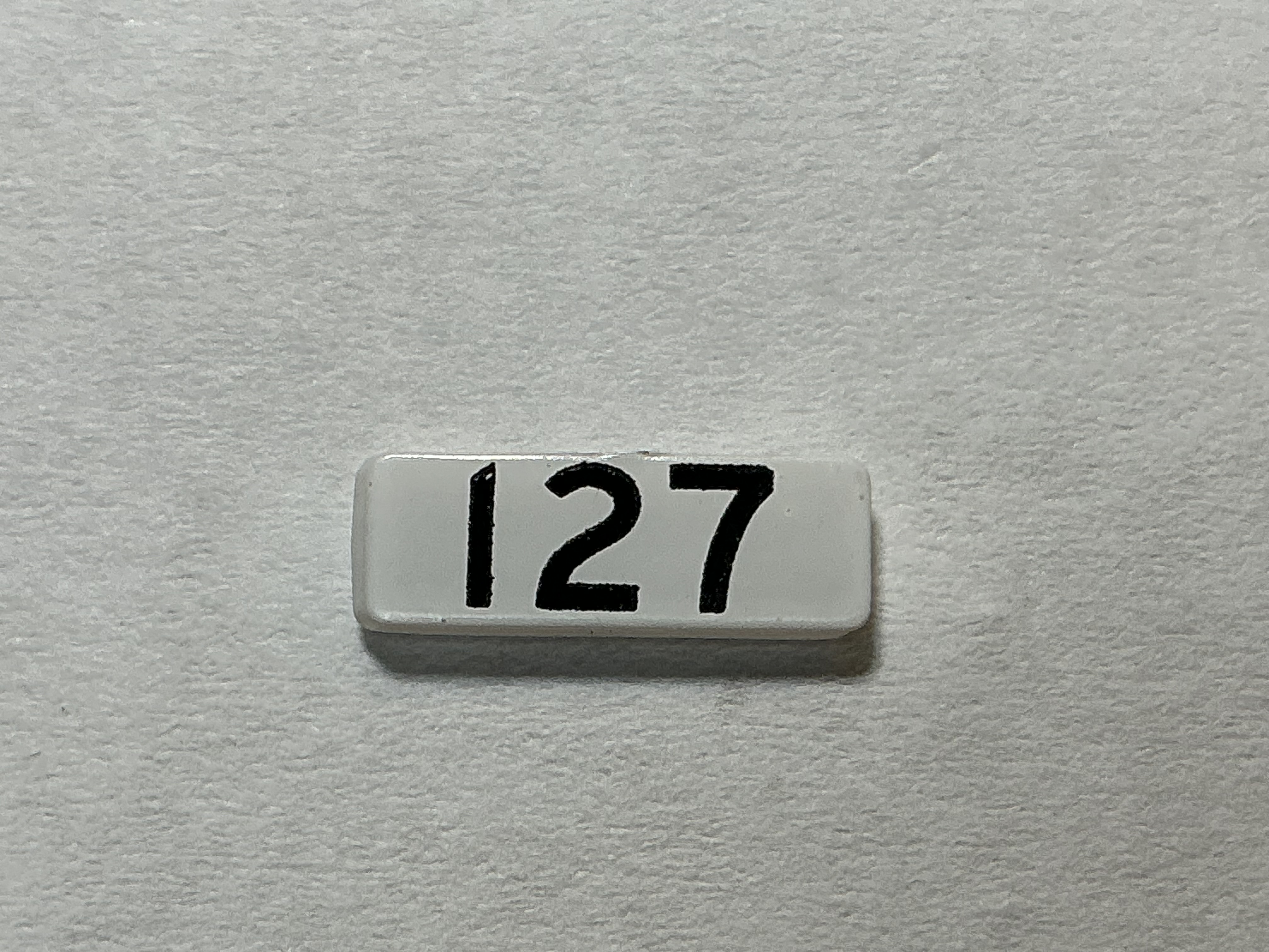 NUMBER BOARD / RH OR LH / FRONT OR REAR / #127 / PREMIER GP-40