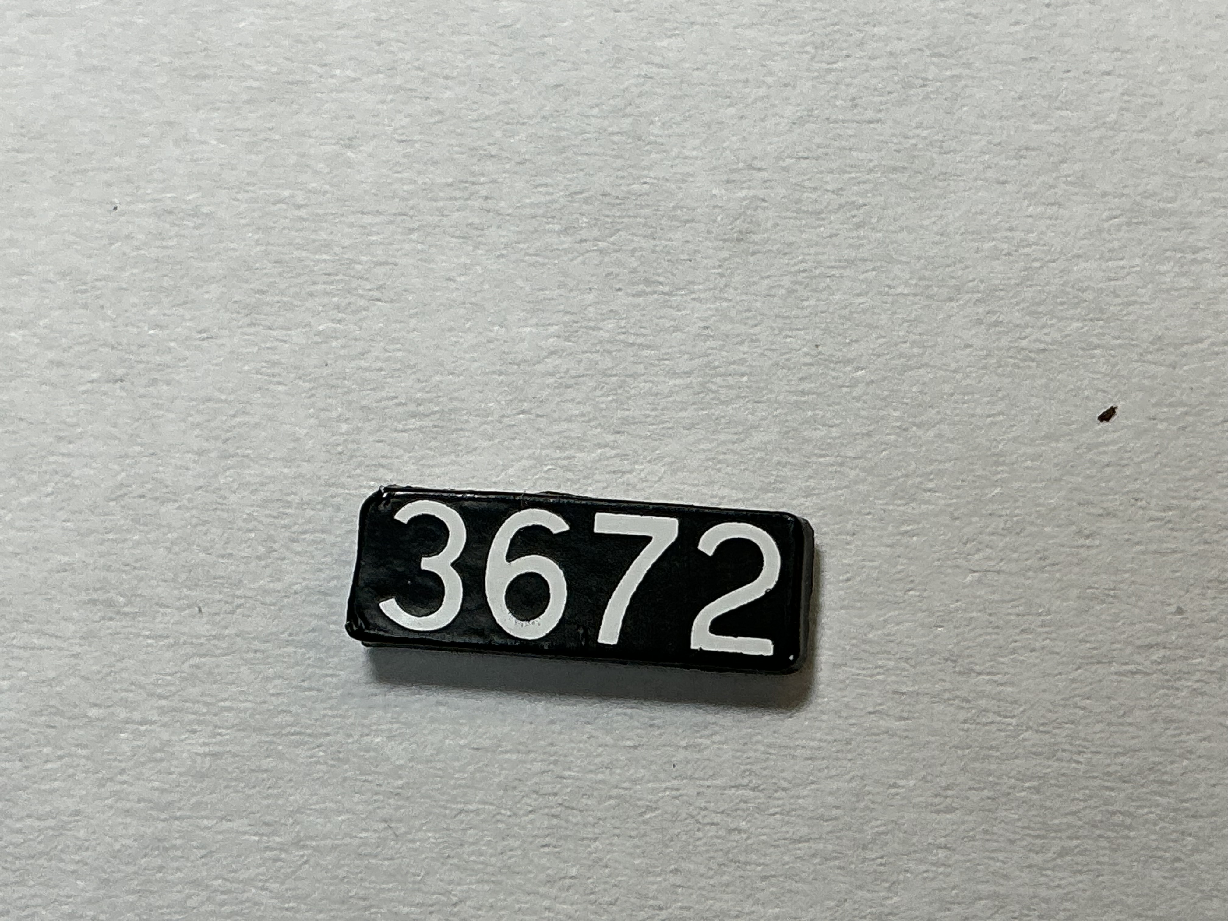 NUMBER BOARD / RH OR LH / FRONT OR REAR / #3672 / PREMIER GP-40