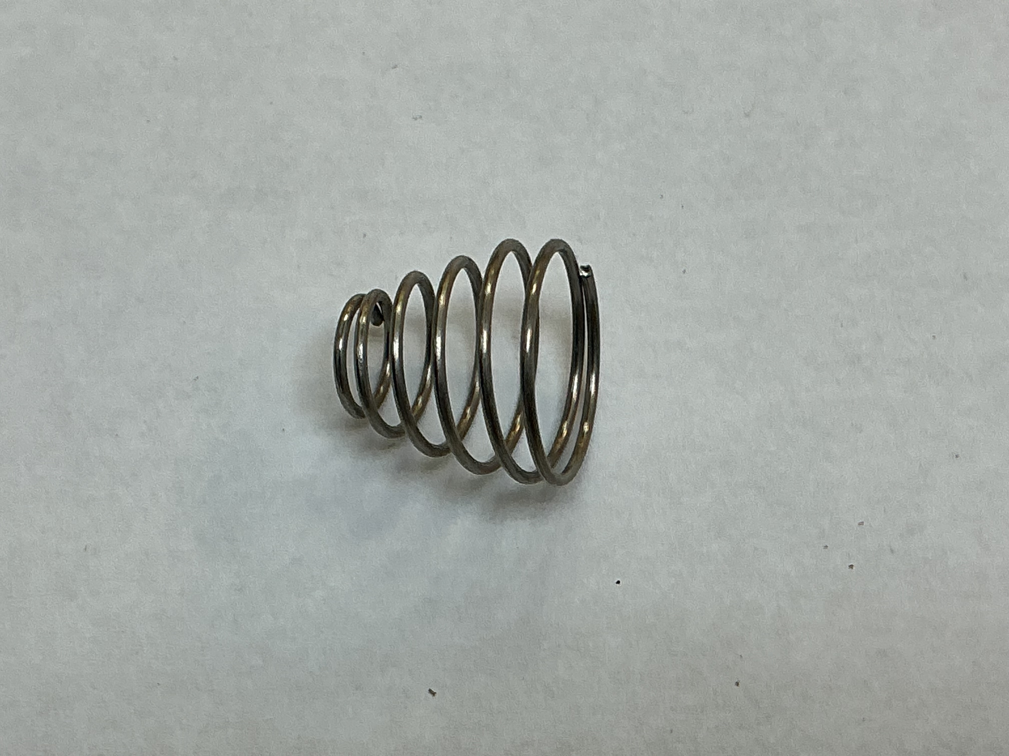 SPRING / CONICAL / 6.7mm D (TOP) x 12.9mm D (BOTTOM) x 11.43mm LONG / 0.6mm THICK WIRE / NICKEL