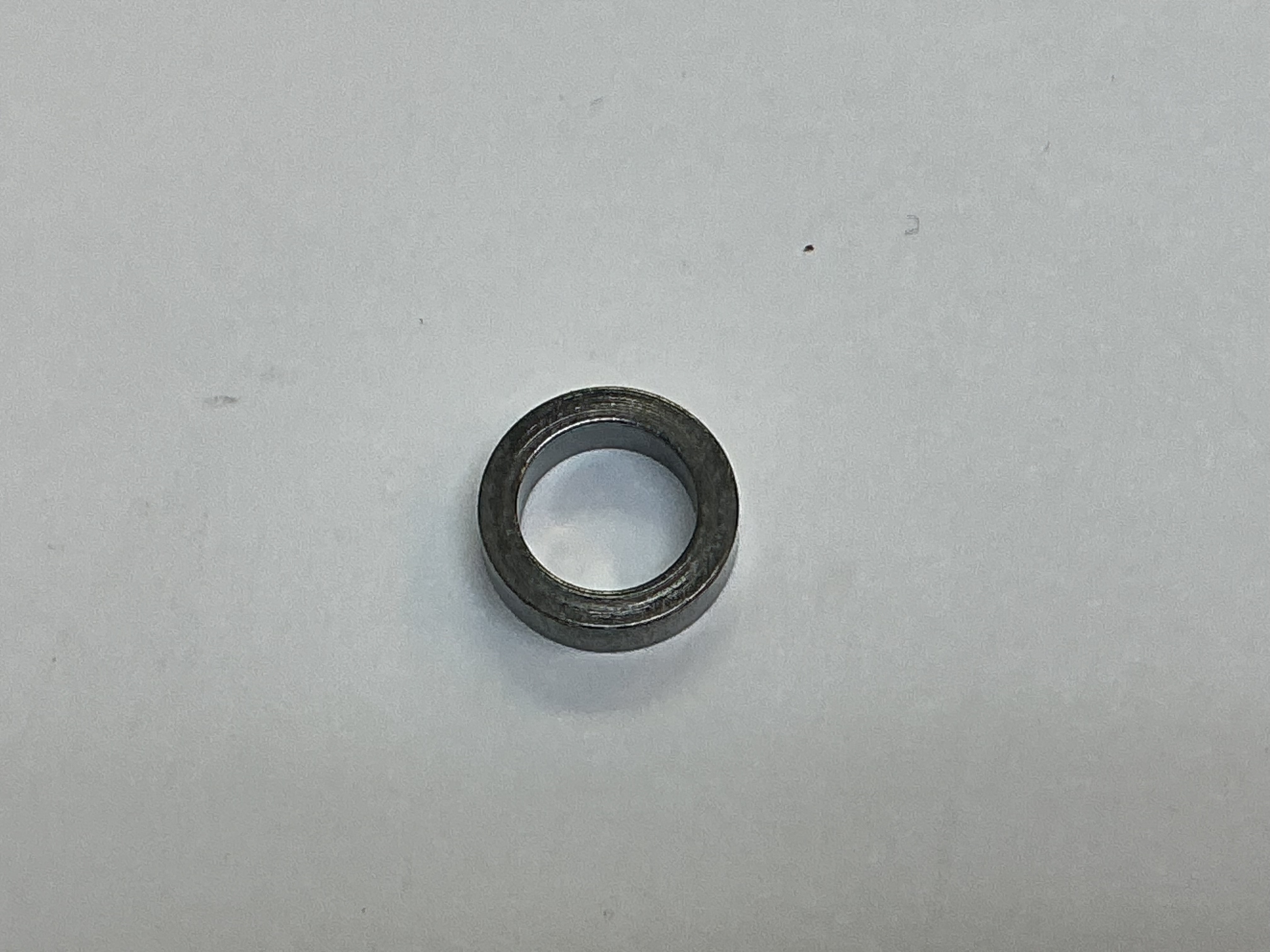 MAIN ROD SPACER / METAL / BLACKENED / 9.98mm O.D. x 6.9mm I.D. x 3.07mm THICK