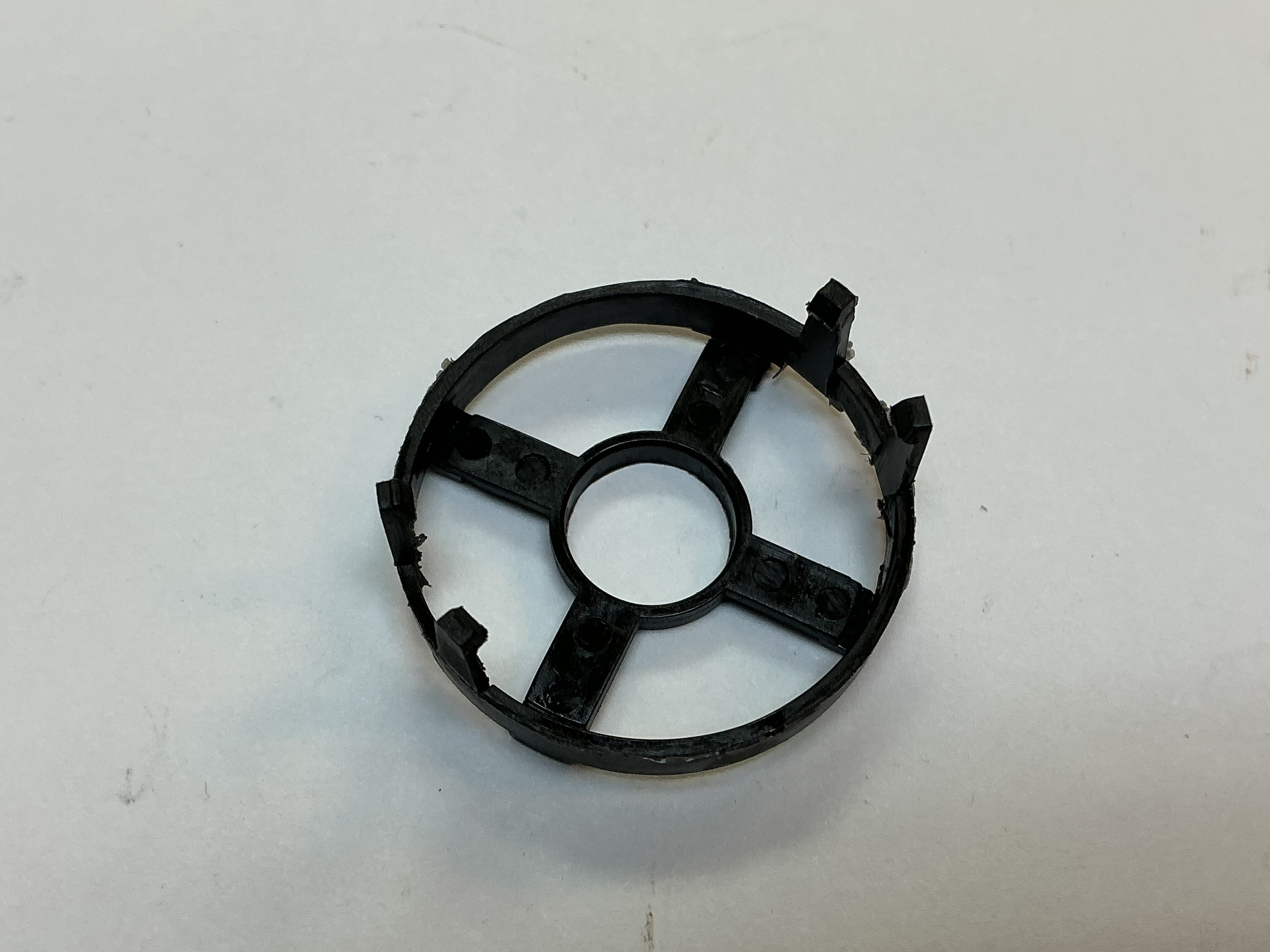 BRACKET / PLASTIC / INSULATES MOTOR LEADS / FOR BLACK FLYWHEEL MOTORS / MABUCHI MOTORS