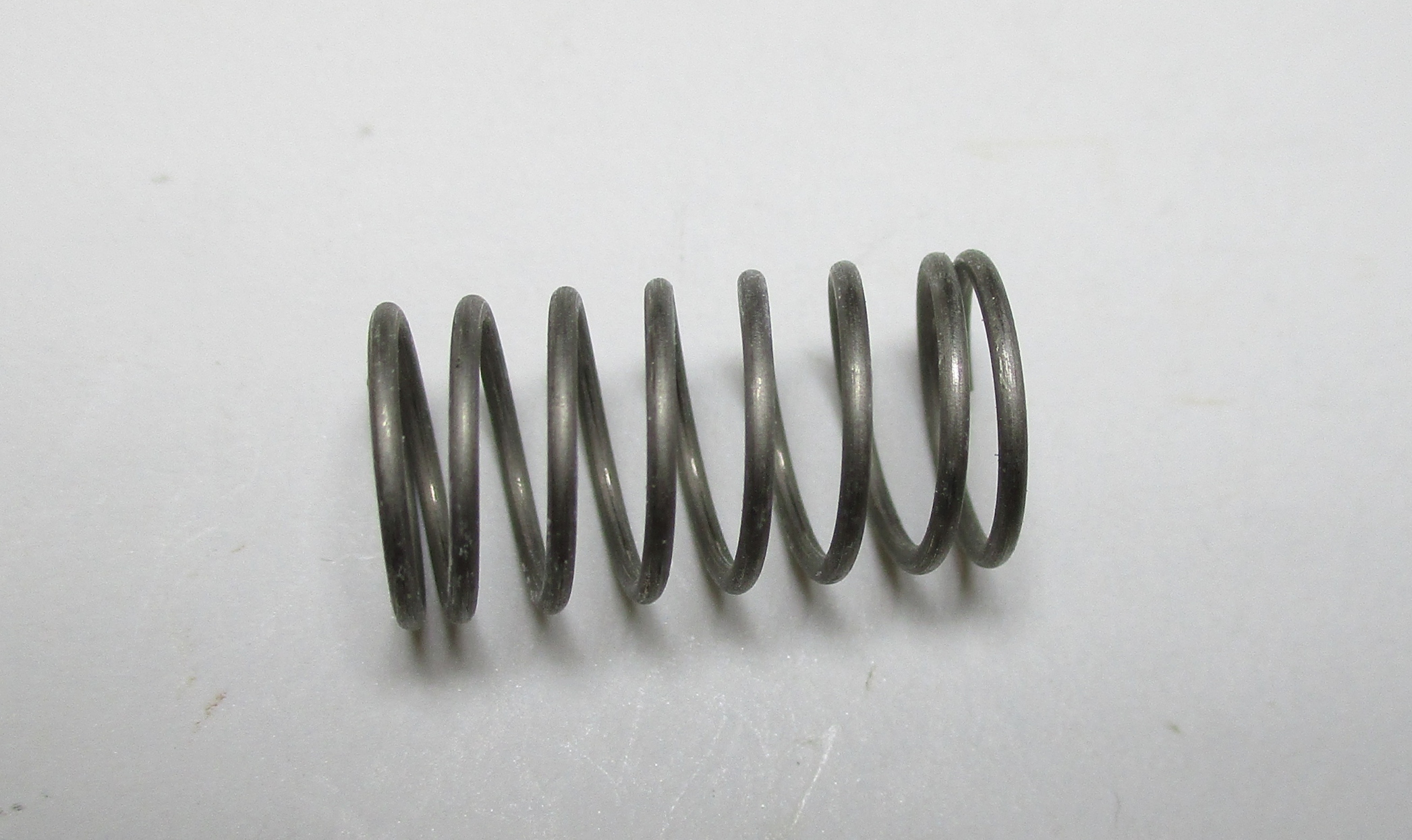 SPRING / COIL / 7mm D x 12mm L x 0.8mm THICK / TENDER TRUCK MOUNT / PREMIER CAB FORWARD