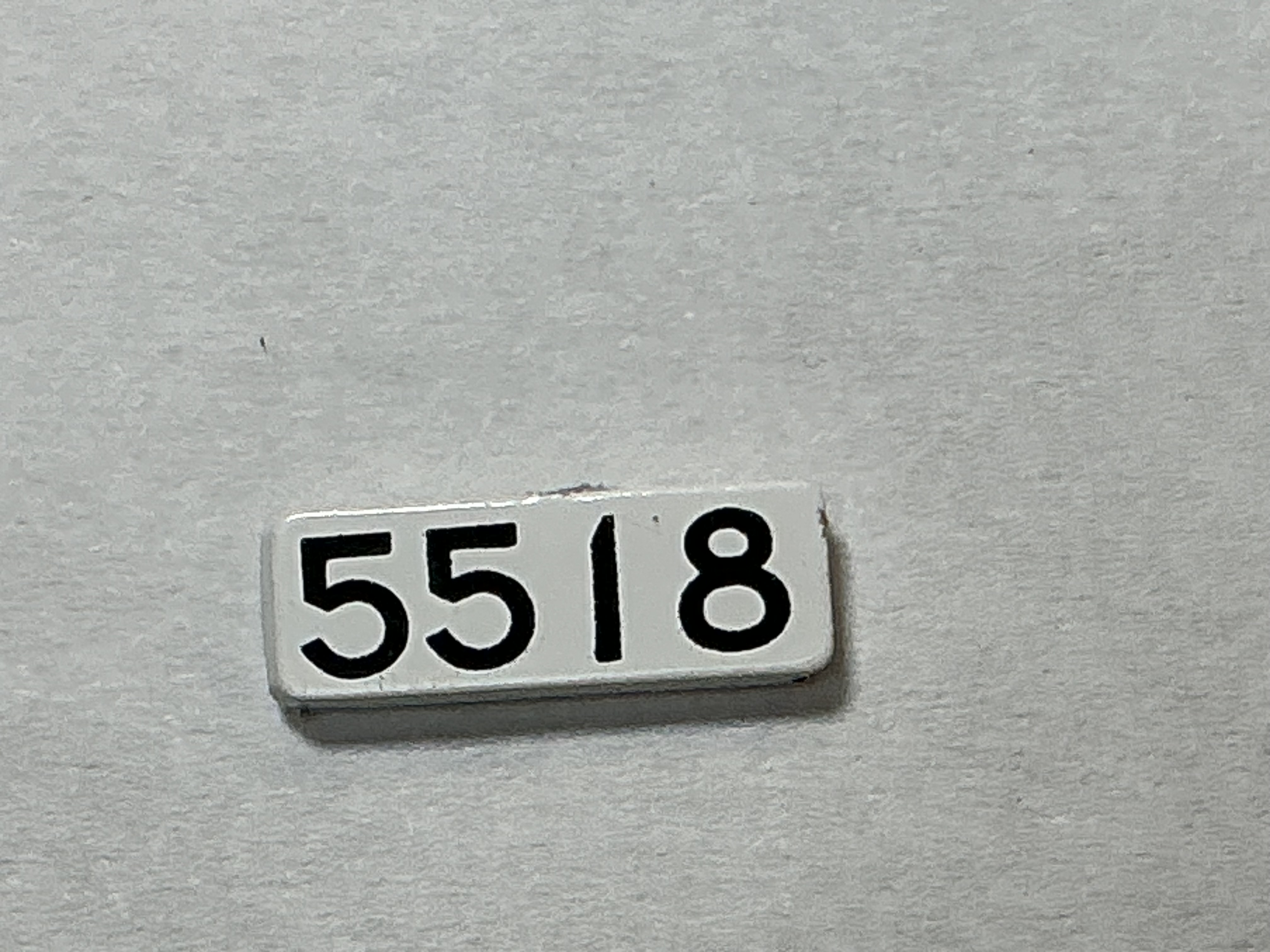 NUMBER BOARD / RH OR LH / FRONT OR REAR / #5518 / PREMIER GP-40