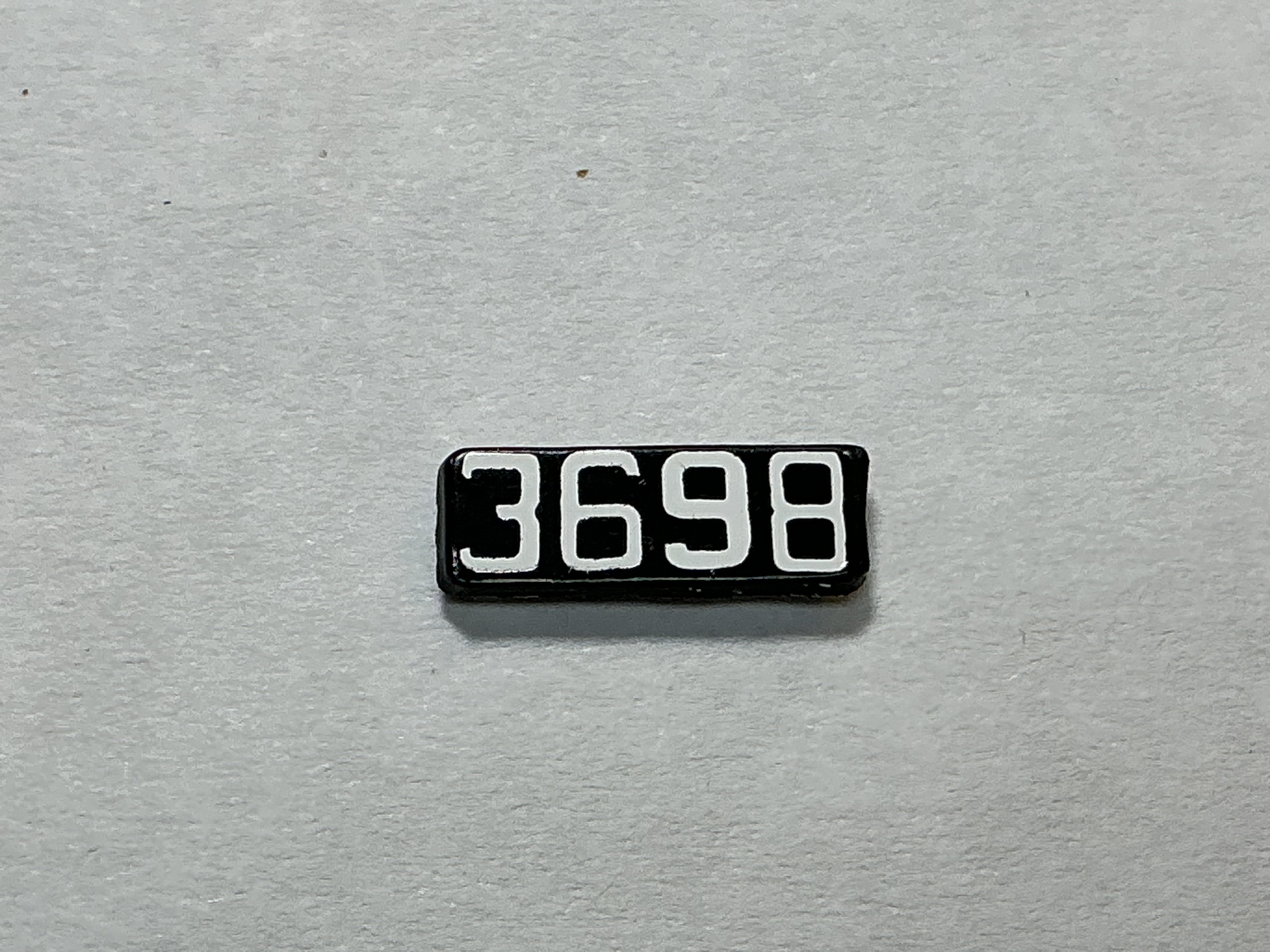 NUMBER BOARD / RH OR LH / FRONT OR REAR / #3698 / PREMIER GP-40