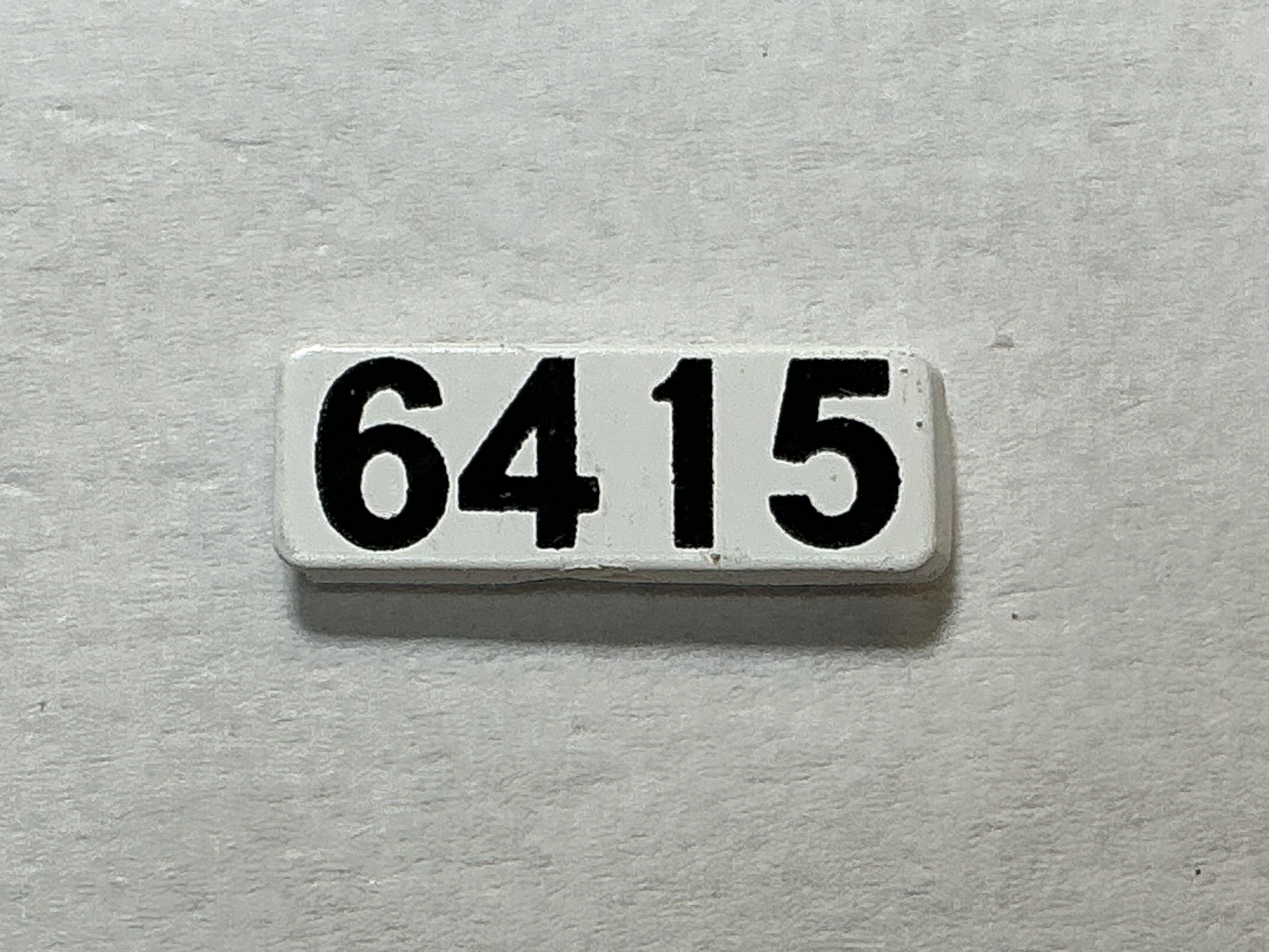 NUMBER BOARD / RH OR LH / FRONT OR REAR / #6415/ PREMIER GP-40