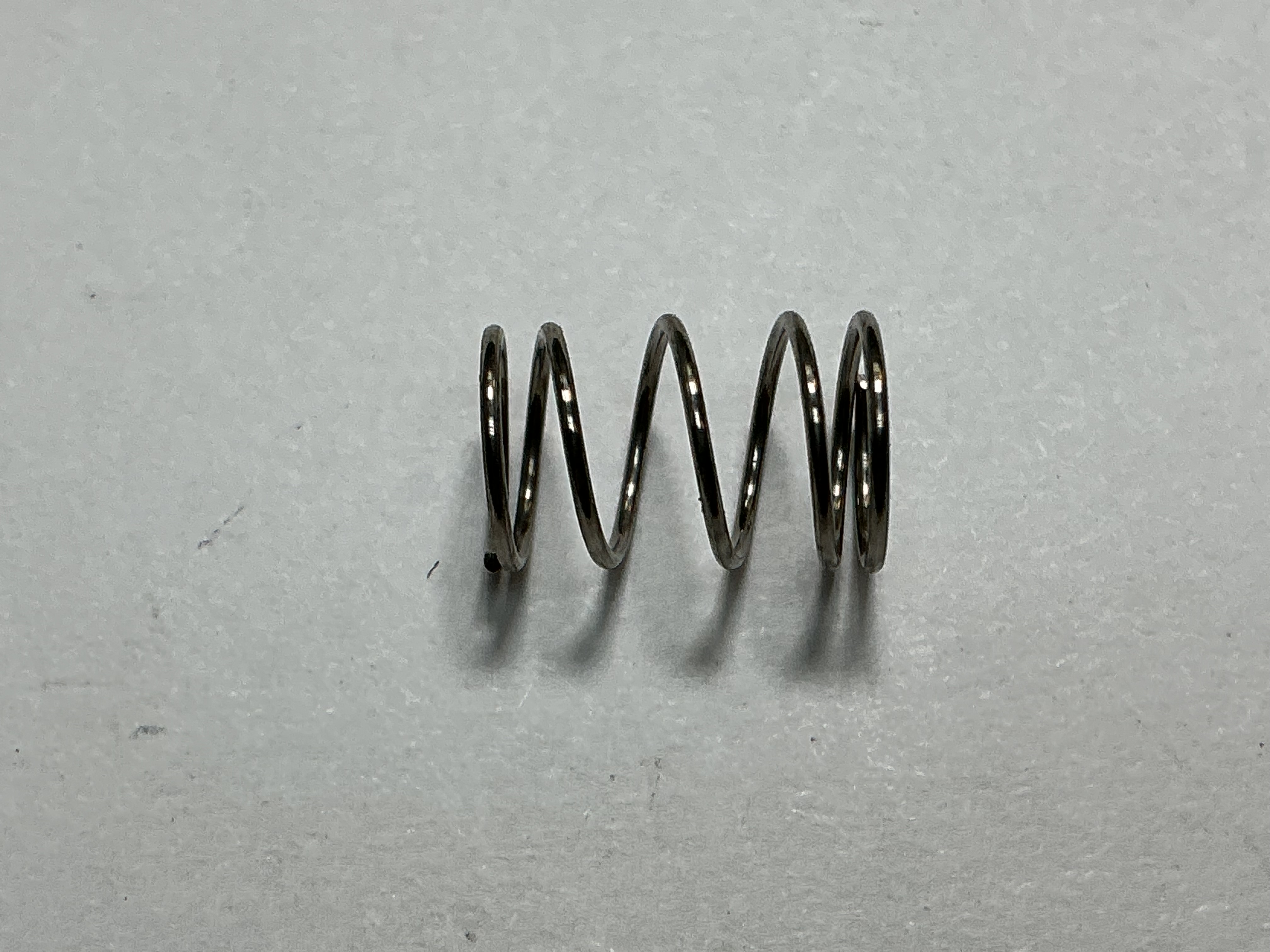 SPRING / COIL / 7.1mm D x 12mm L x 0.6mm THICK / BLACK 