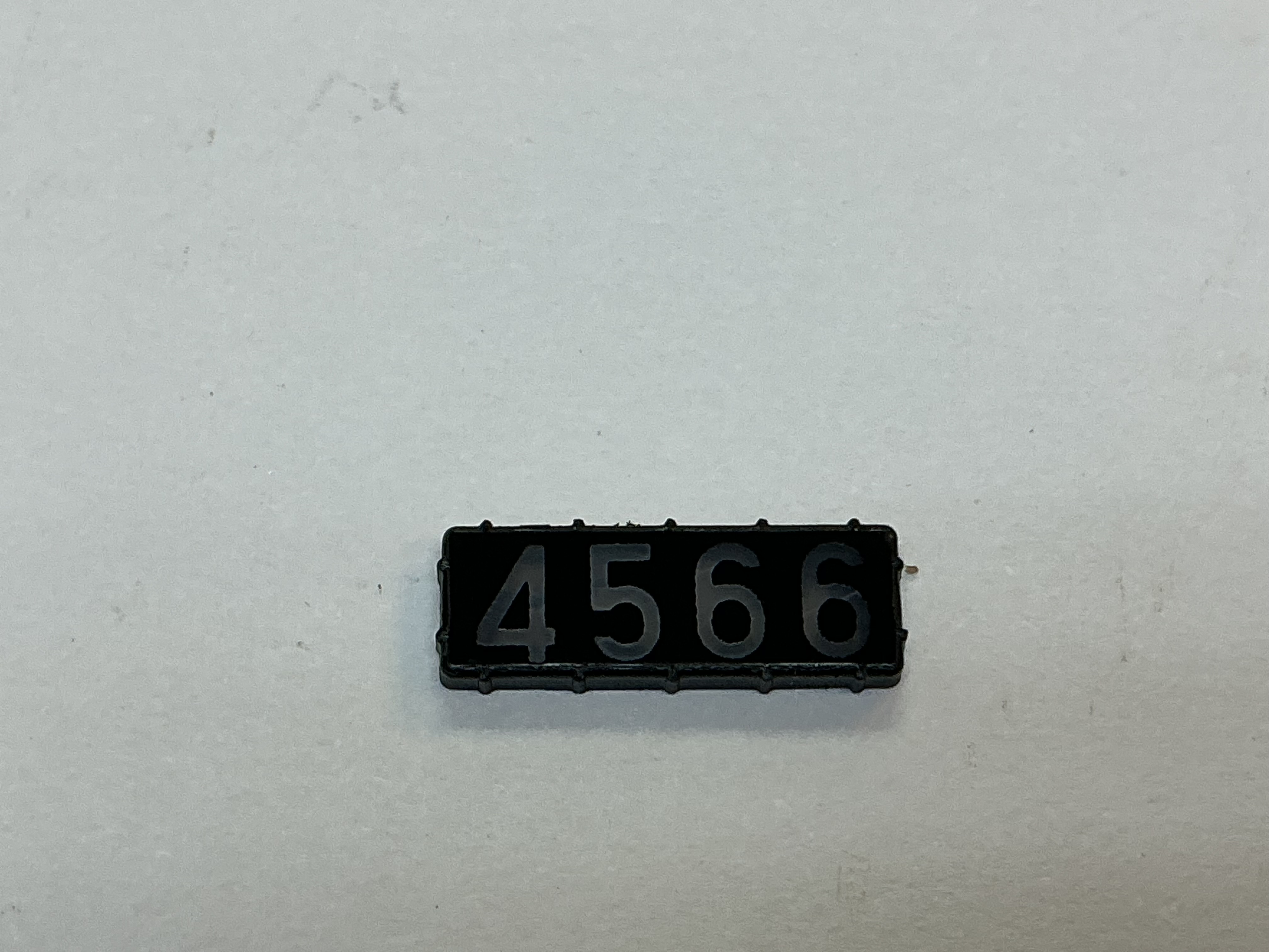 NUMBER BOARD / RH OR LH / FRONT OR REAR / #4566 / PREMIER E-33