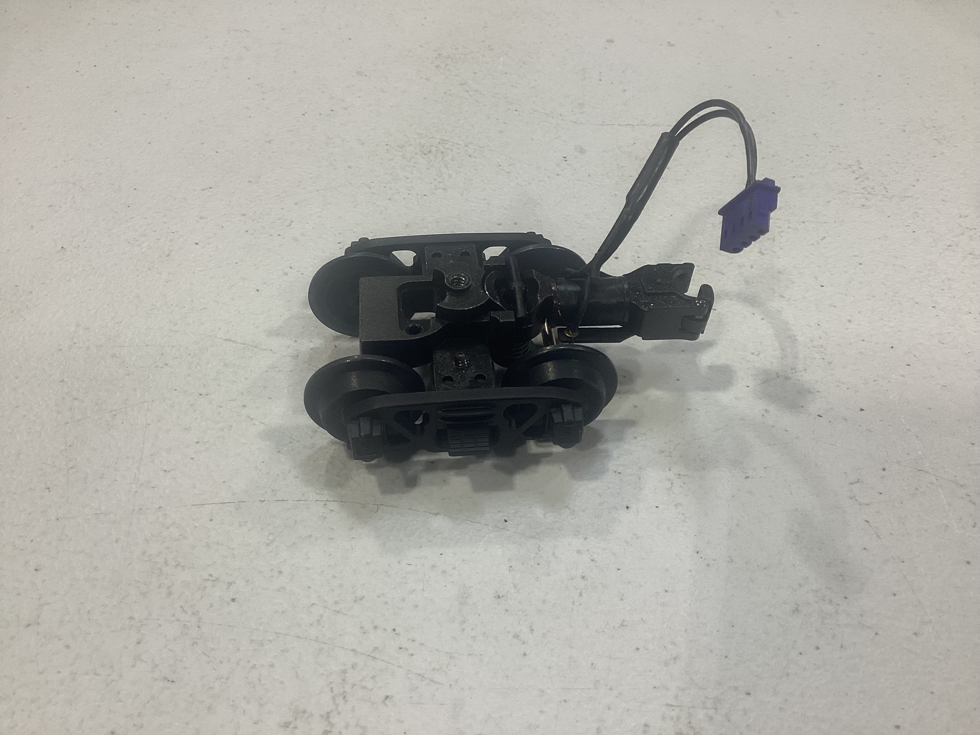 TENDER TRUCK / 4-WHEEL / REAR / W/COUPLER / W/O CHAINS / BLACK / RAILKING USRA 2-8-8-2, CAMELBACK 4-6-0