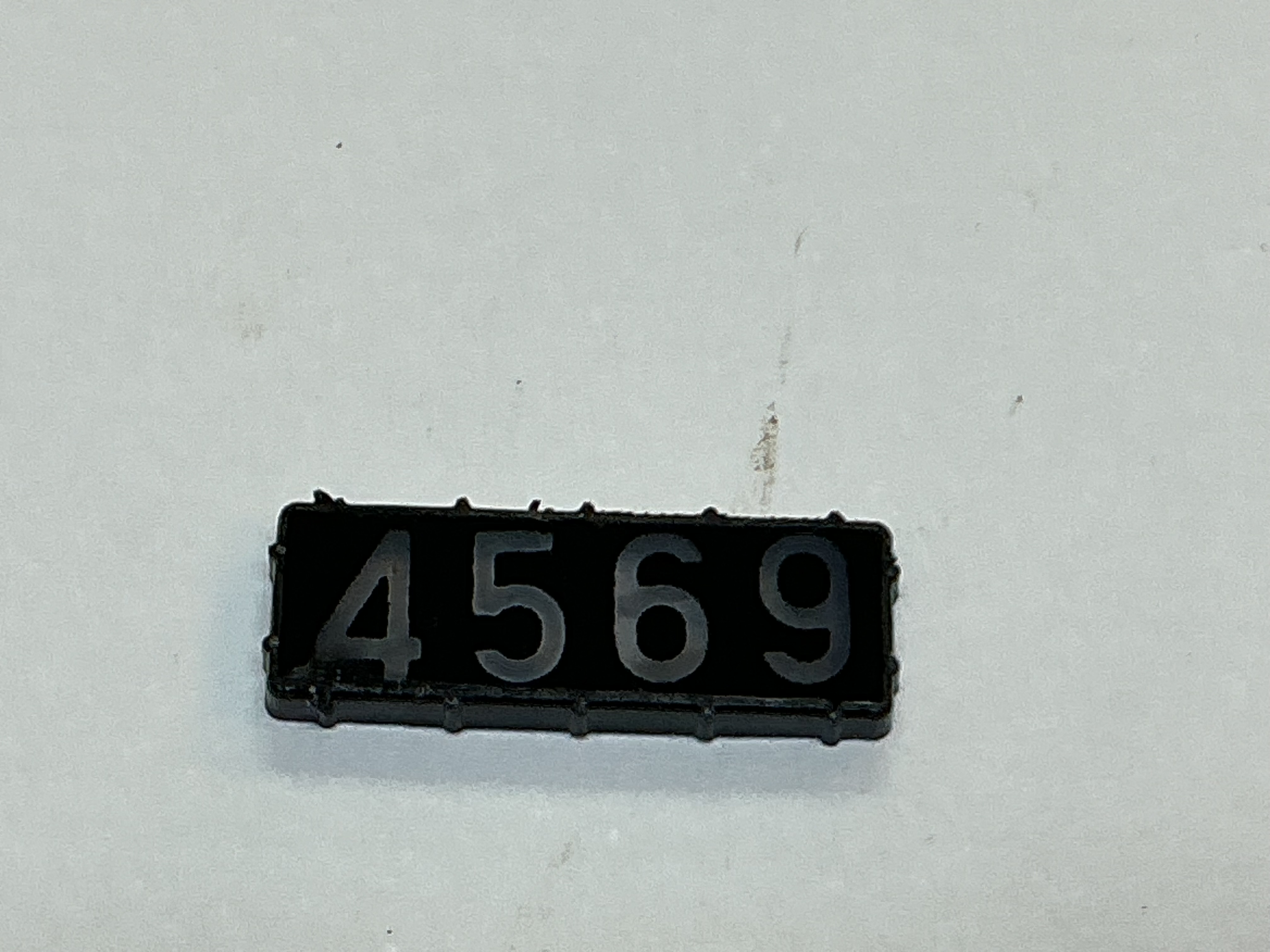 NUMBER BOARD / RH OR LH / FRONT OR REAR / #4569 / PREMIER E-33