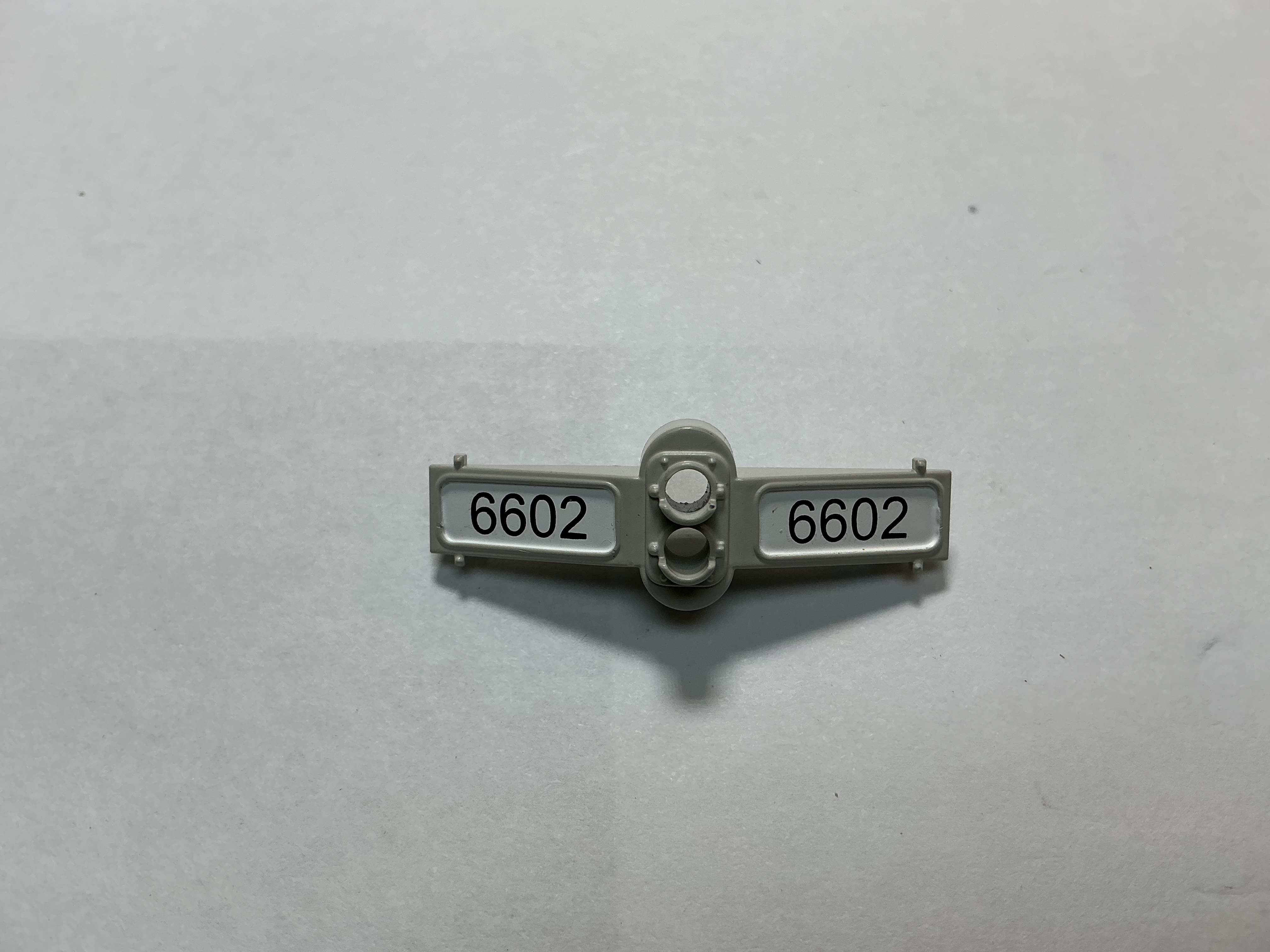 NUMBER BOARD / FRONT / W/HEADLIGHT HOUSING / GREY / #6602 / PREMIER SD60M