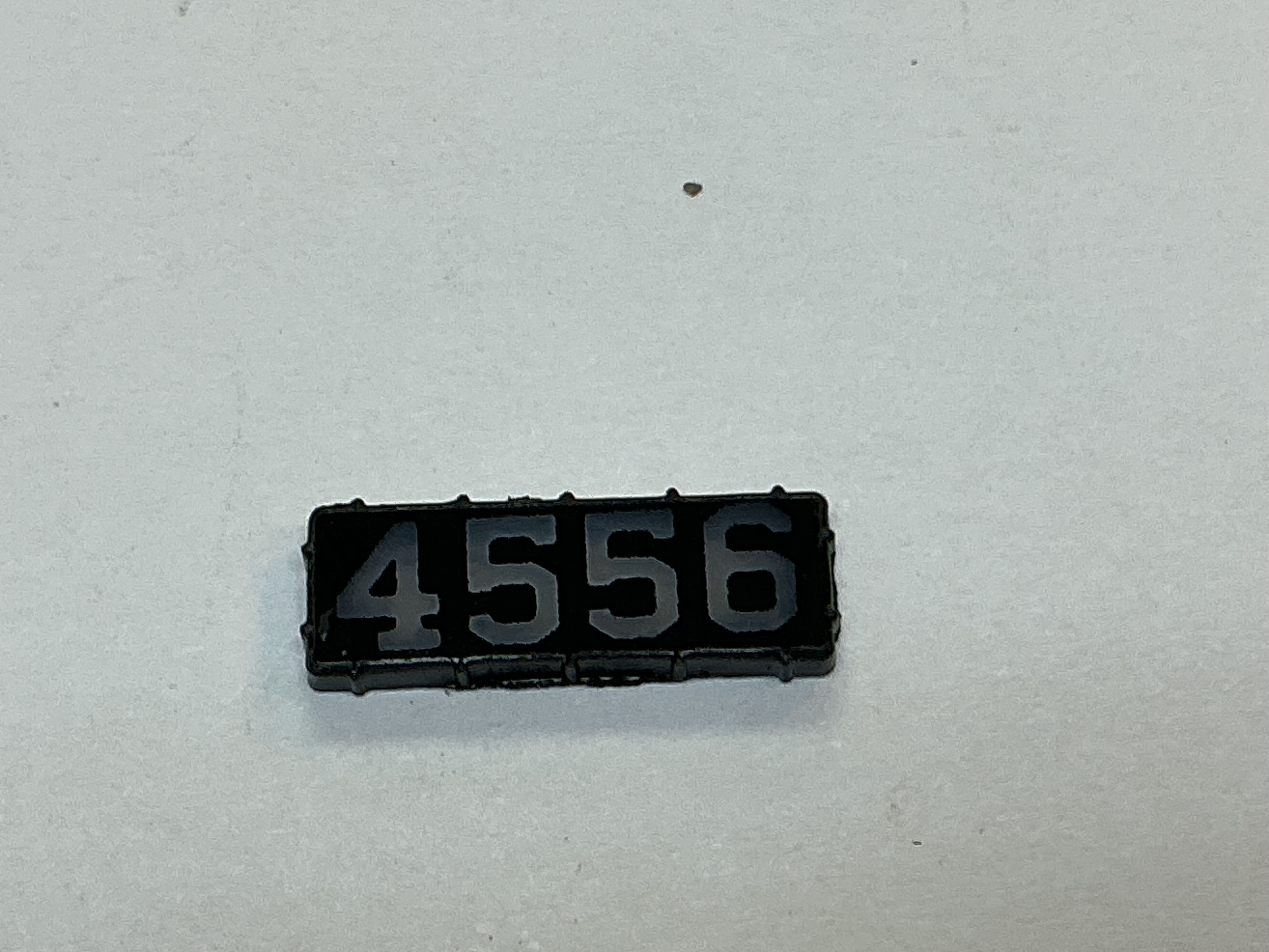 NUMBER BOARD / RH OR LH / FRONT OR REAR / #4556 / PREMIER E-33