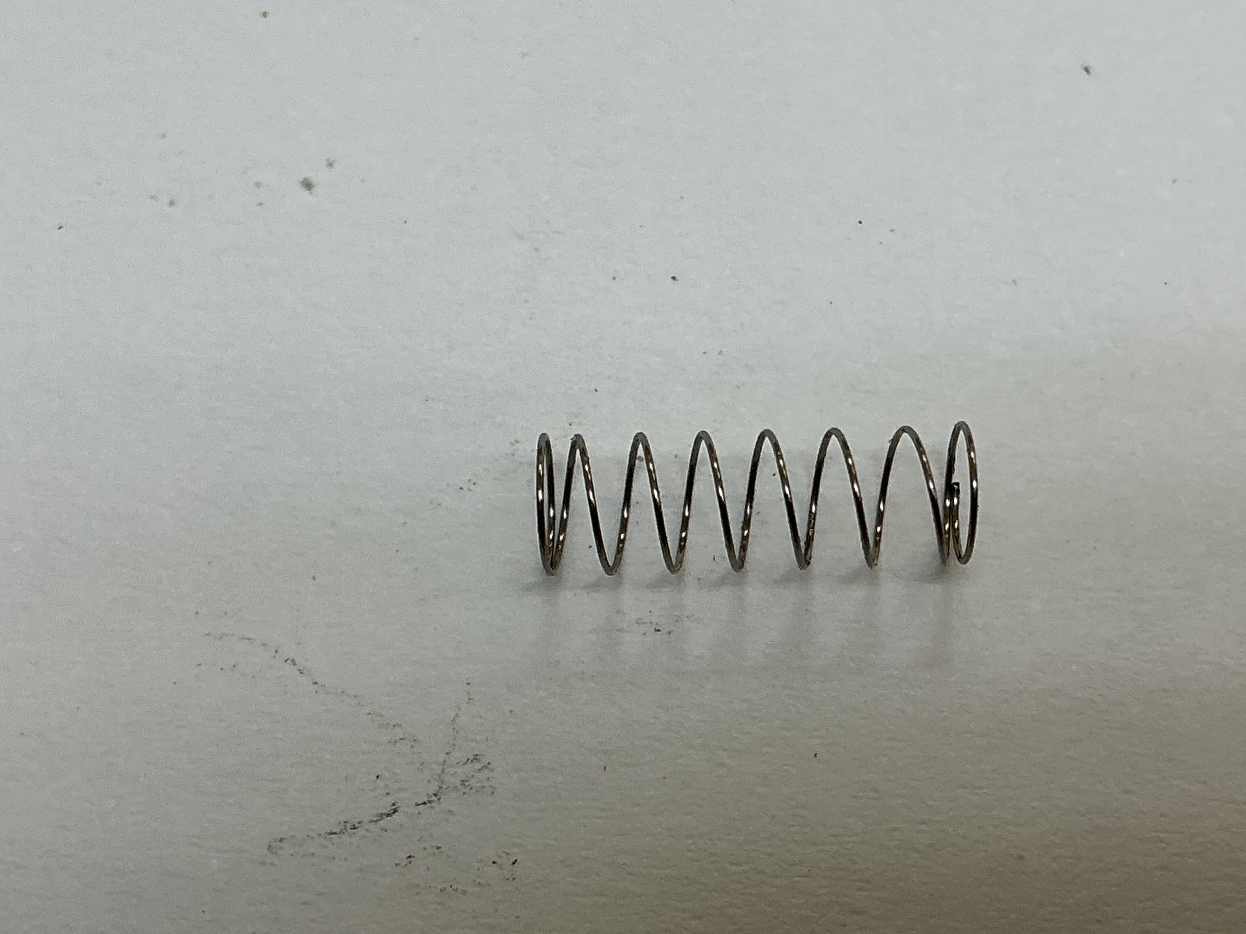 SPRING / COIL / 4.6mm D x 12.7mm L x 0.10mm THICK / WHEEL BRUSH TENSION / RAILKING ONE GAUGE ES44AC