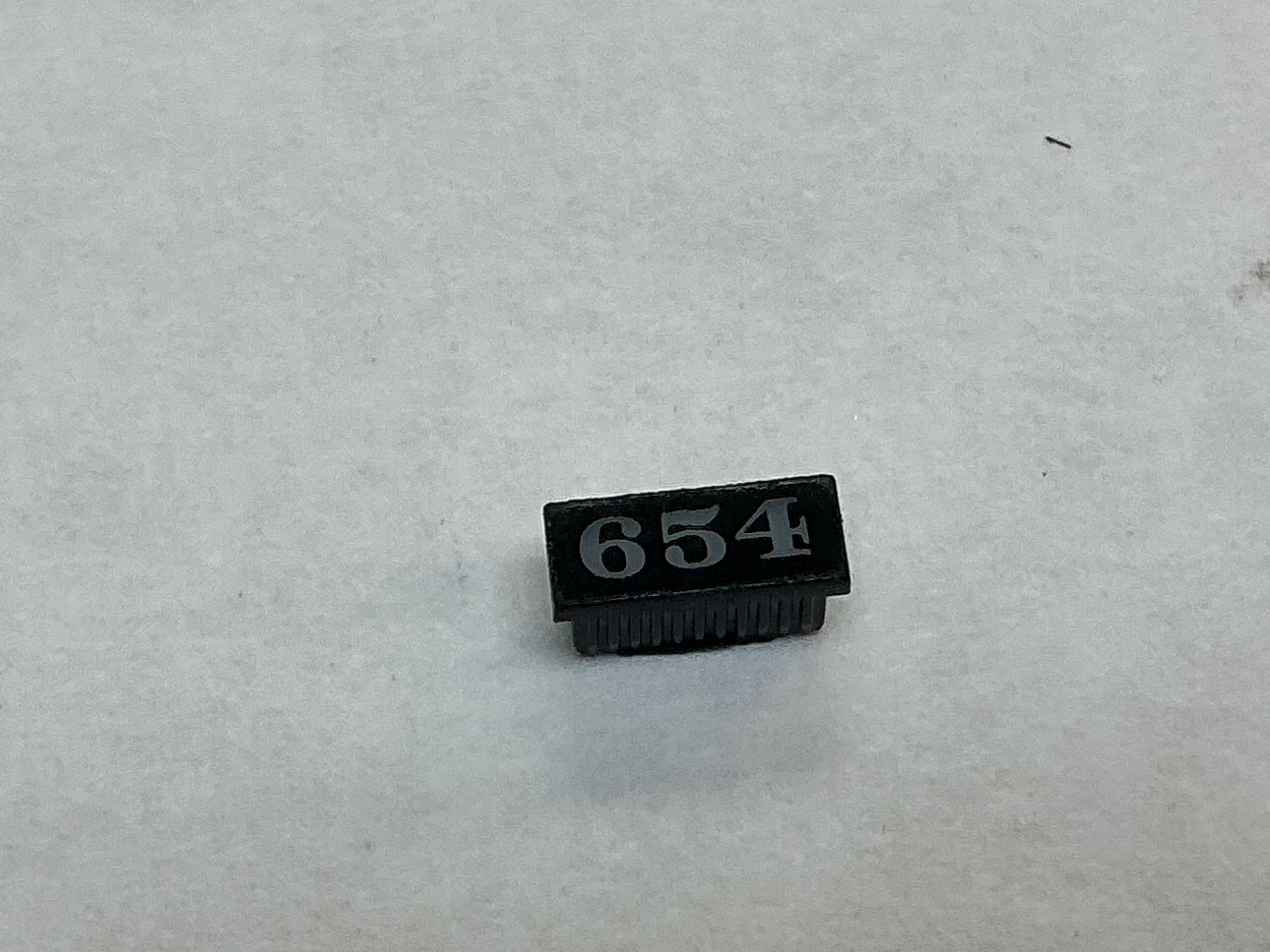 NUMBER BOARD / RH OR LH / HEADLIGHT HOUSING / #654 / PREMIER CAMELBACK 4-6-0
