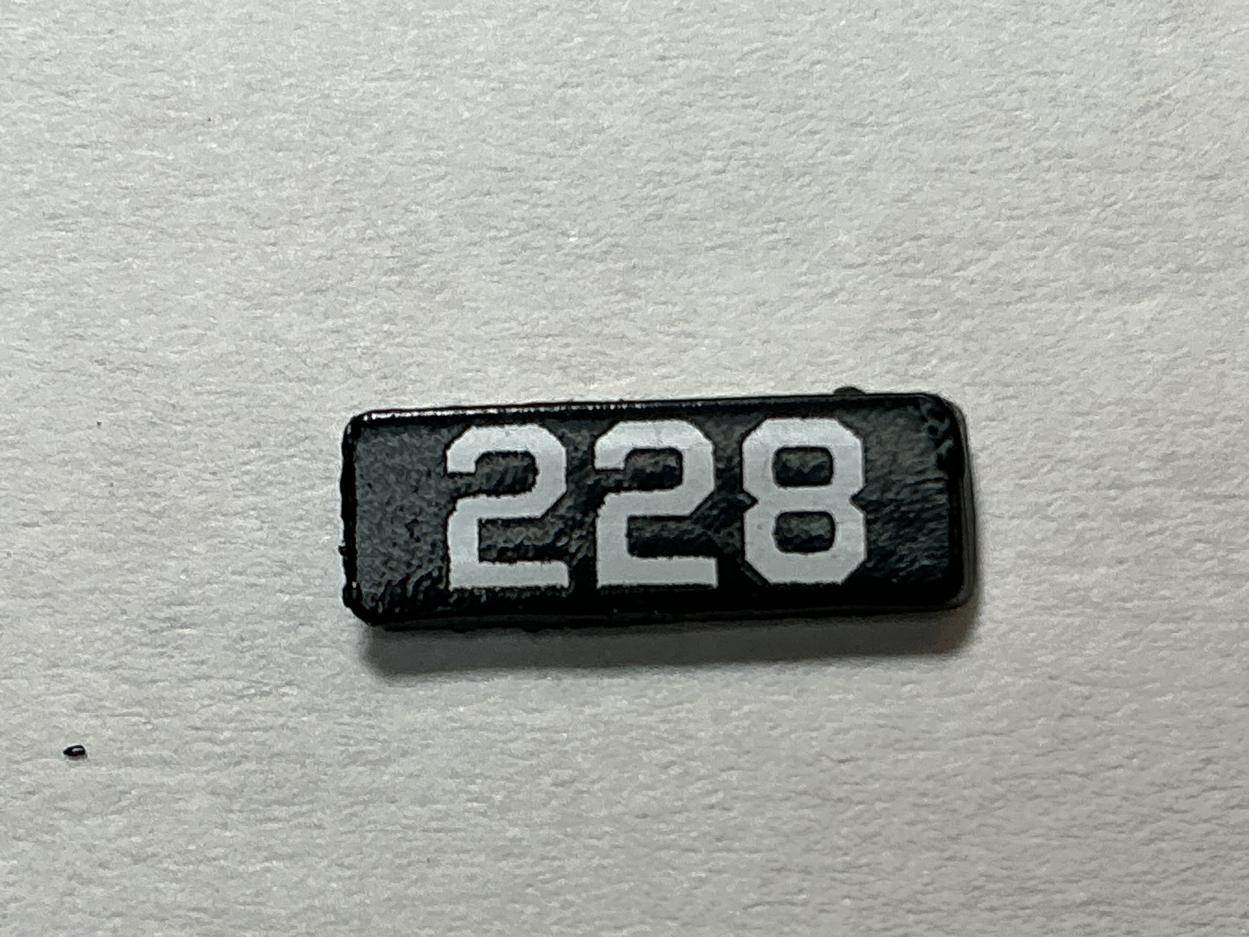 NUMBER BOARD / RH OR LH / FRONT OR REAR / #228 / PREMIER GP-40