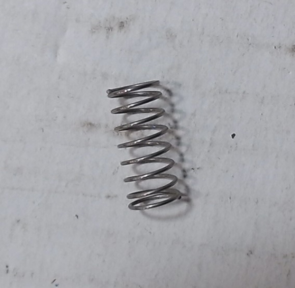 SPRING / COIL / 6.4mm D x 13.8mm L x 0.4mm THICK / NICKEL / REAR COUPLER TENSION / USE IE-0000007