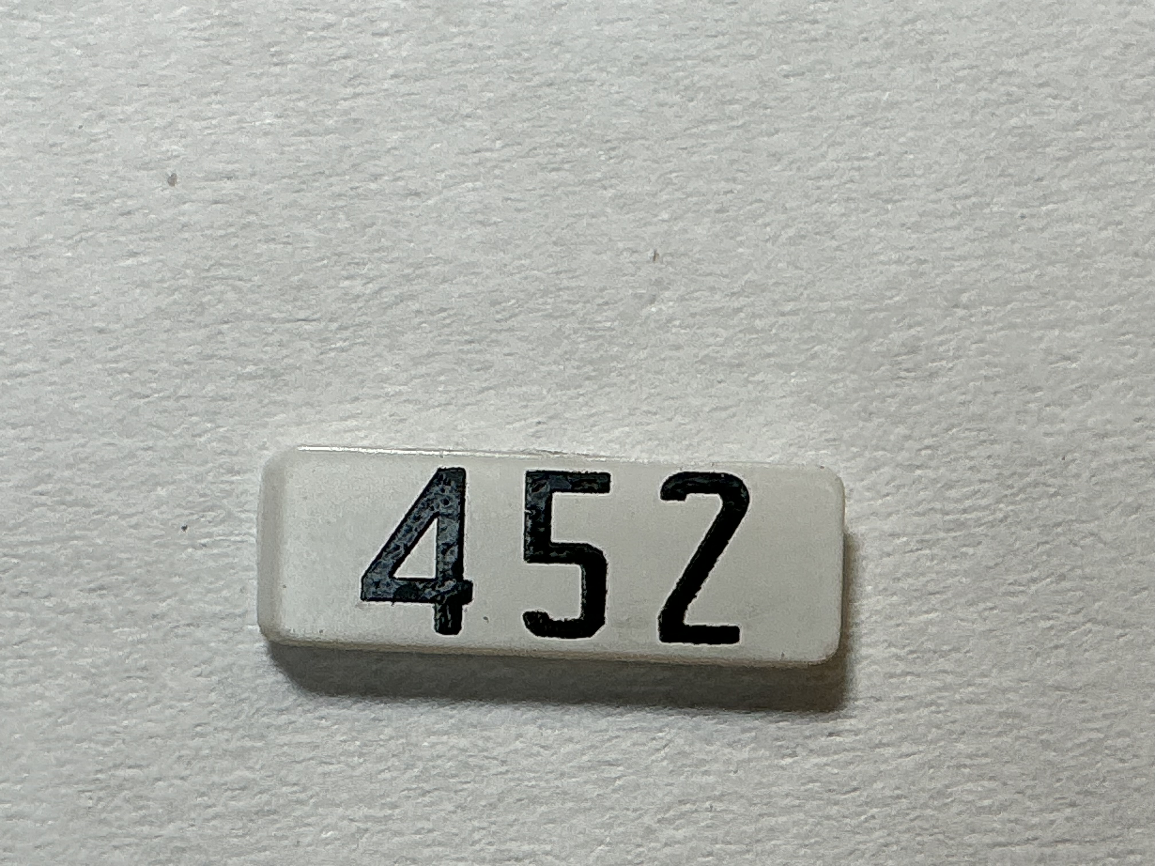 NUMBER BOARD / RH OR LH / FRONT OR REAR / #452 / PREMIER GP-40