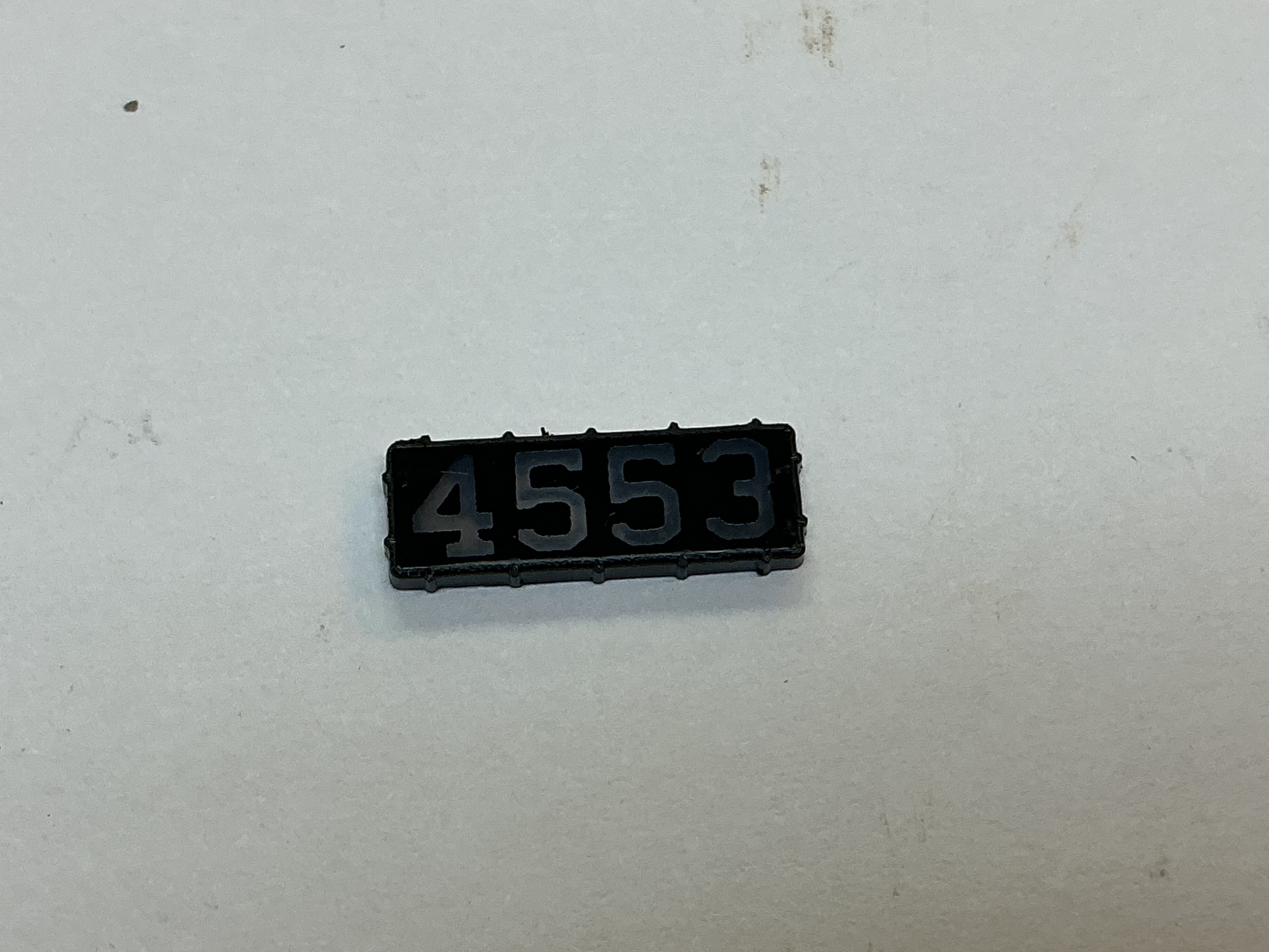 NUMBER BOARD / RH OR LH / FRONT OR REAR / #4653 / PREMIER E-33