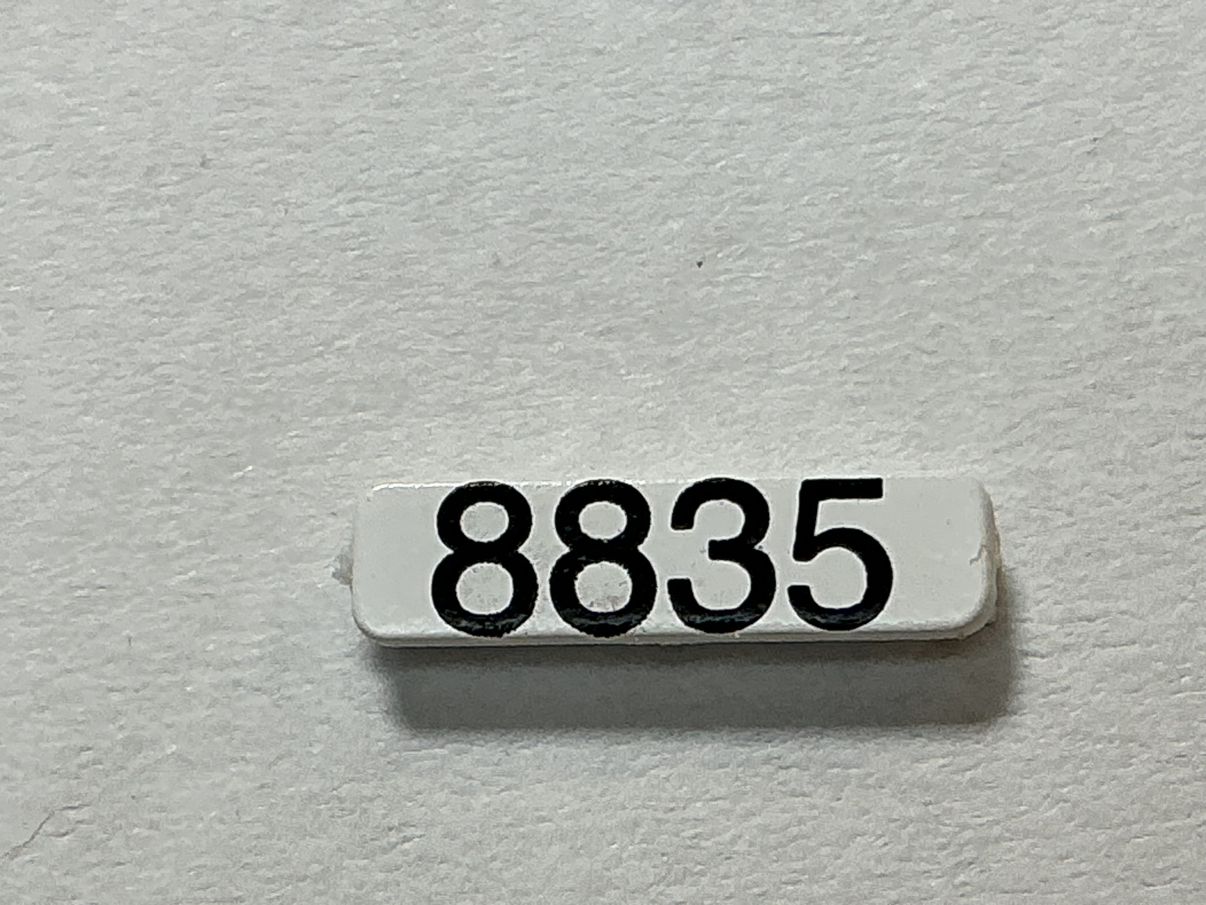 NUMBER BOARD / RH OR LH / FRONT OR REAR / #8835 / PREMIER GP-40