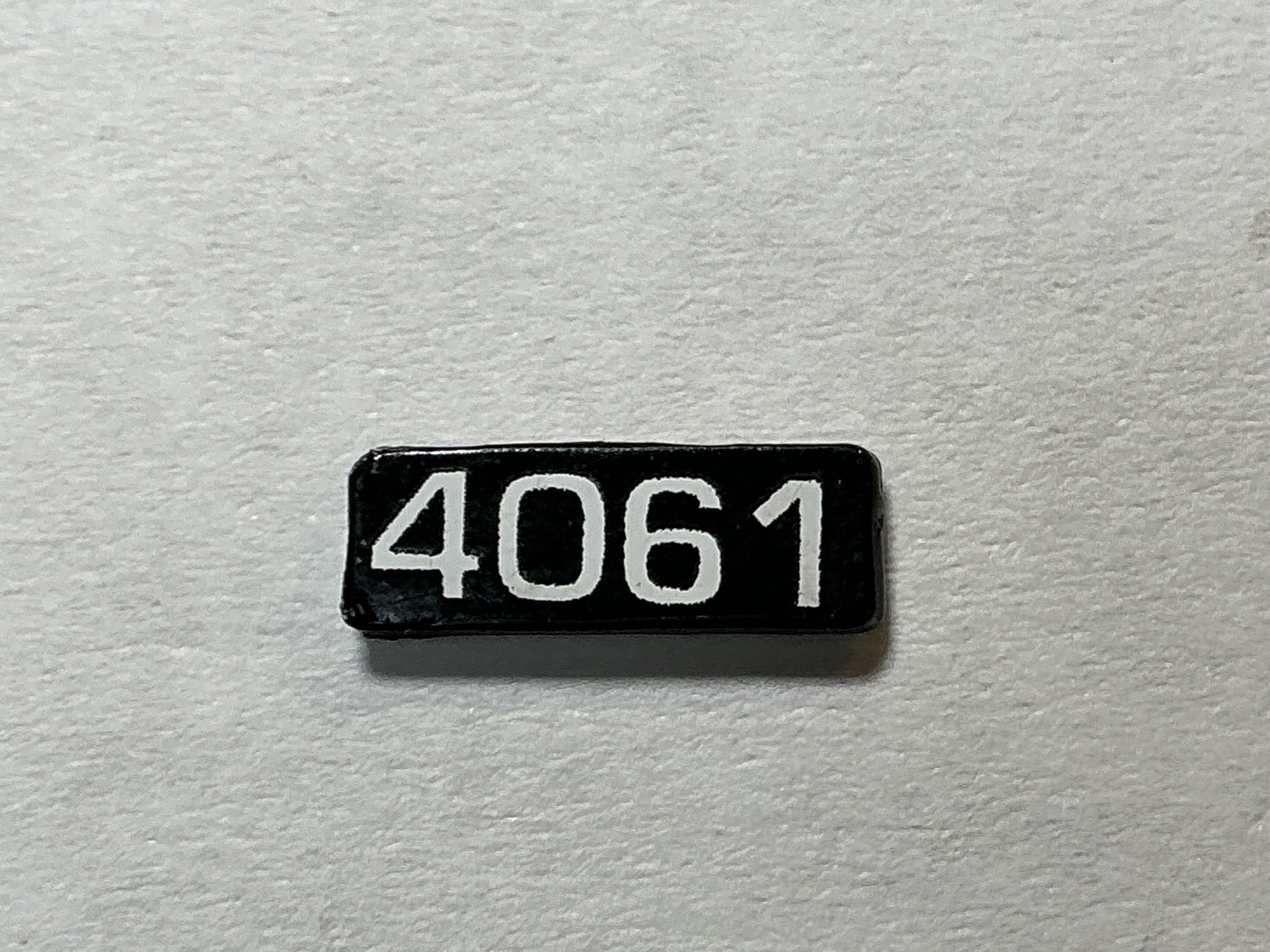 NUMBER BOARD / RH OR LH / FRONT OR REAR / #4061 / PREMIER GP-40