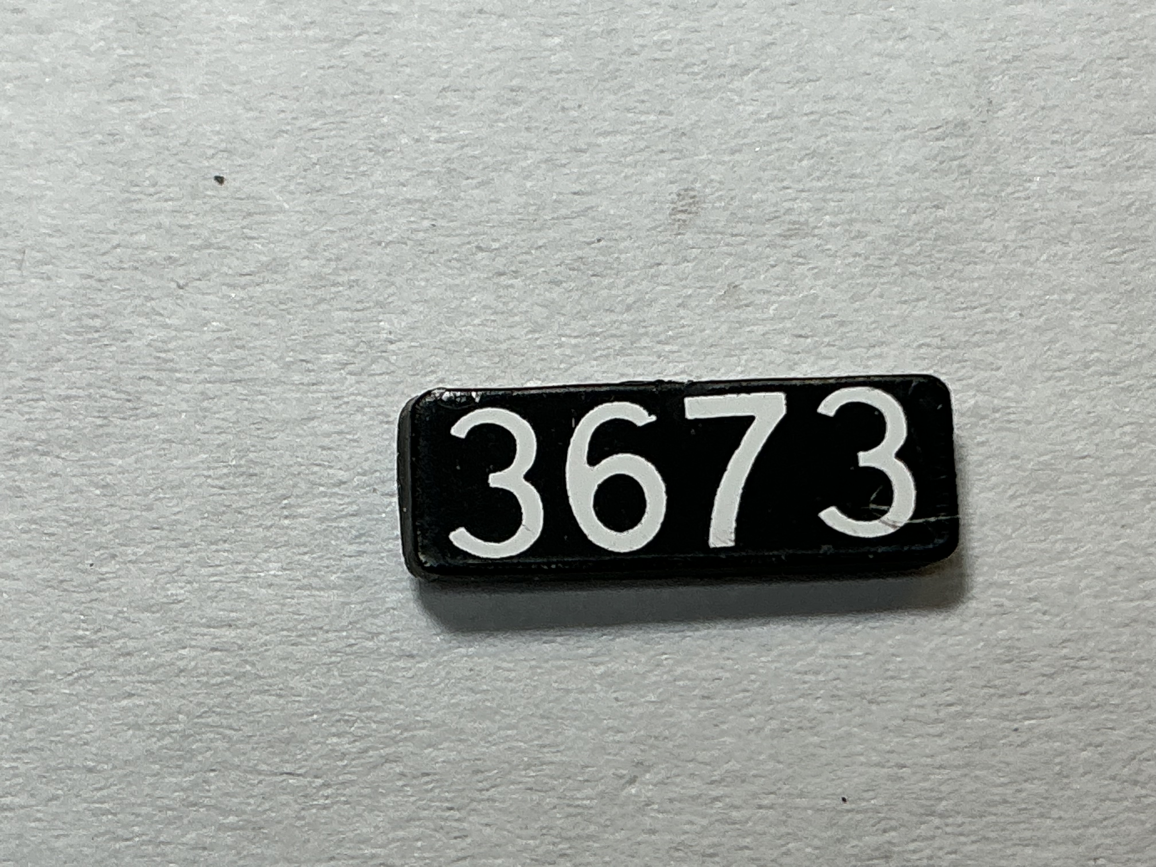 NUMBER BOARD / RH OR LH / FRONT OR REAR / #3673 / PREMIER GP-40
