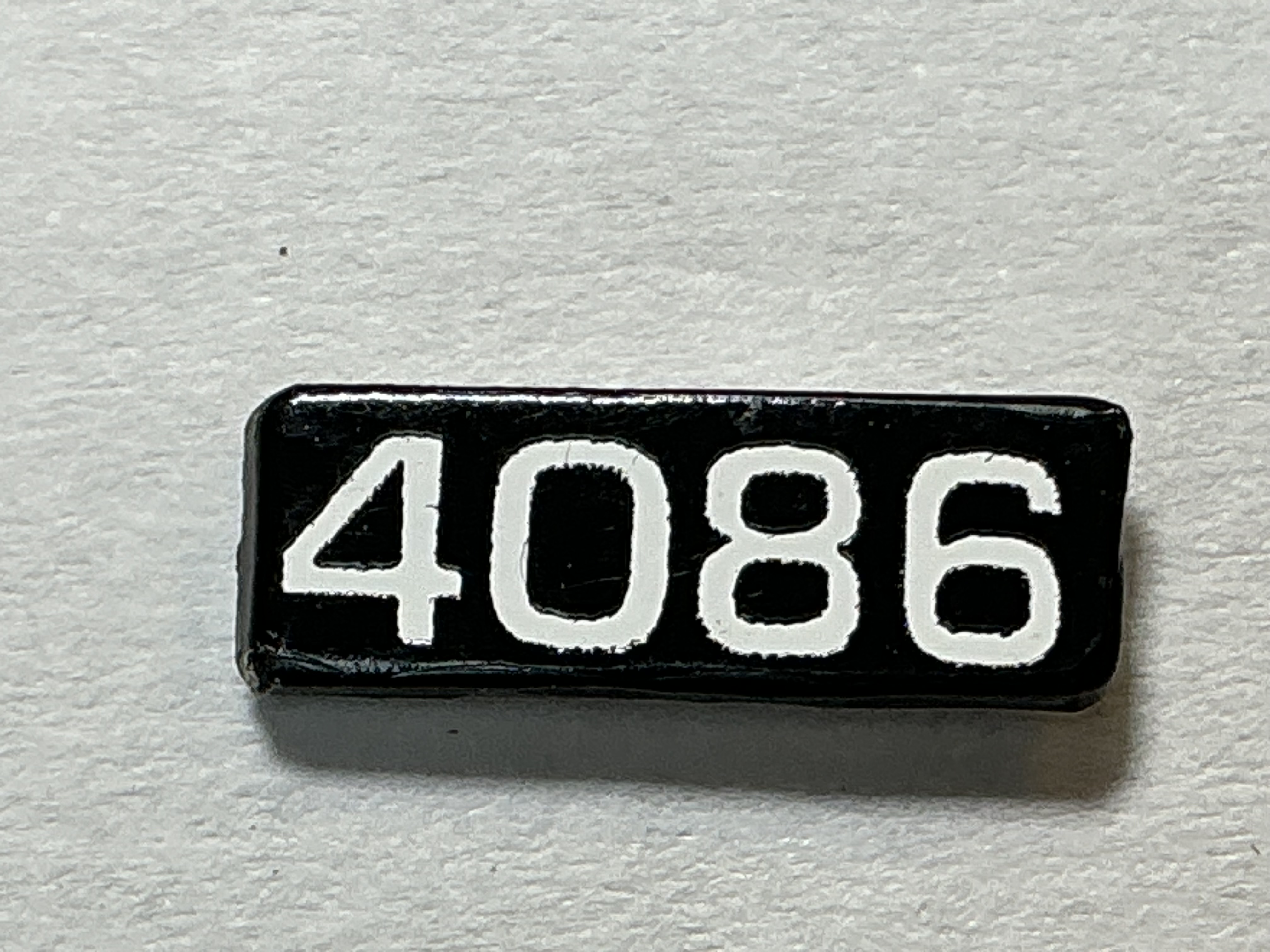NUMBER BOARD / RH OR LH / FRONT OR REAR / #4086 / PREMIER GP-40