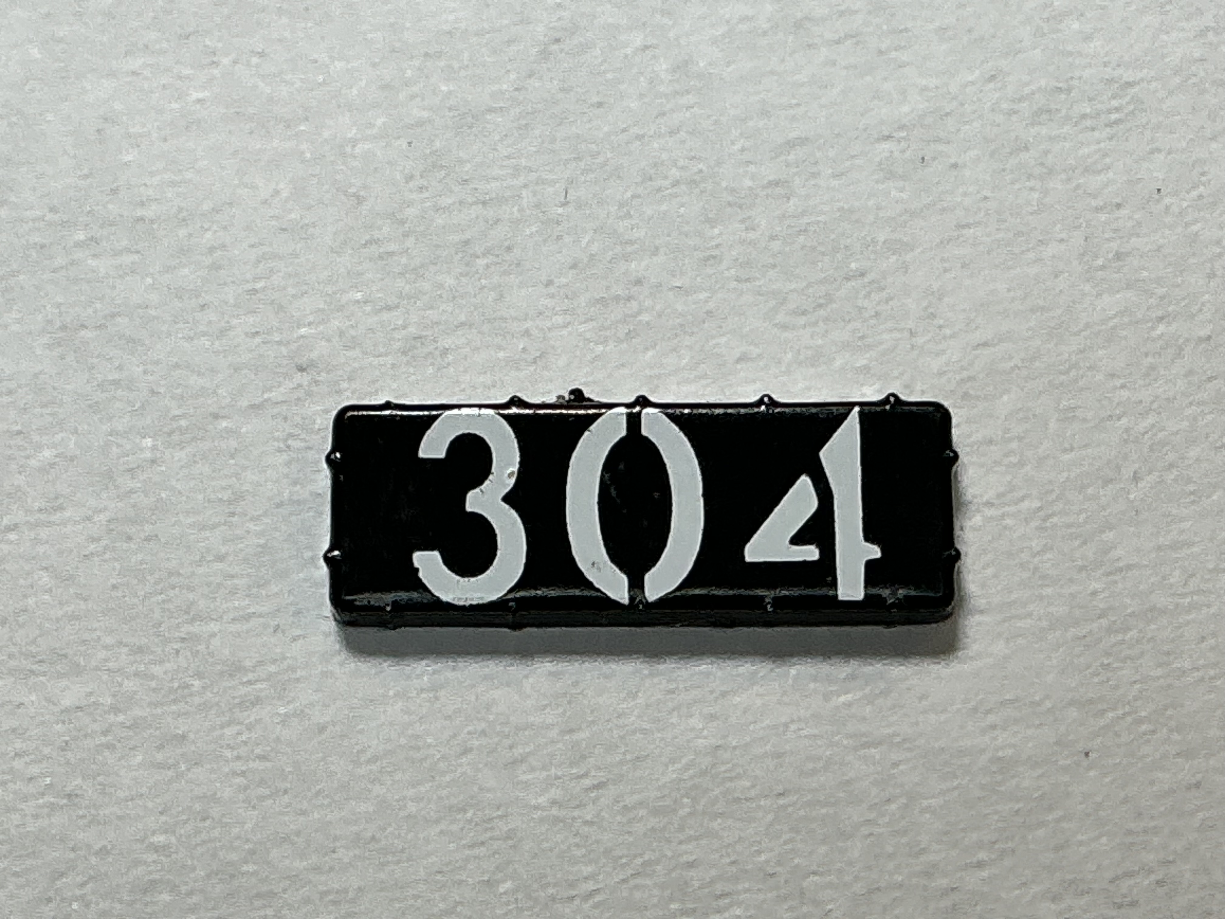 NUMBER BOARD / RH OR LH / FRONT OR REAR / #304 / PREMIER GP-40