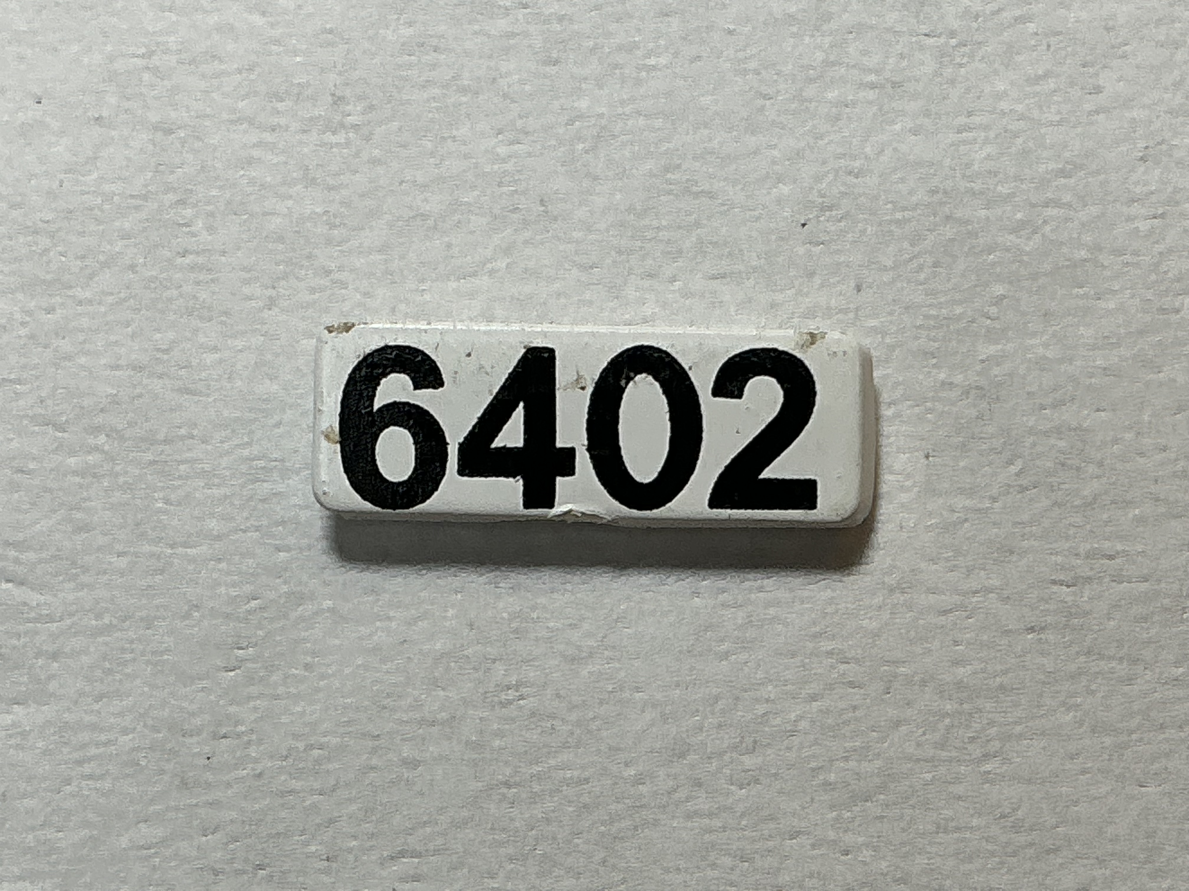 NUMBER BOARD / RH OR LH / FRONT OR REAR / #6402 / PREMIER GP-40
