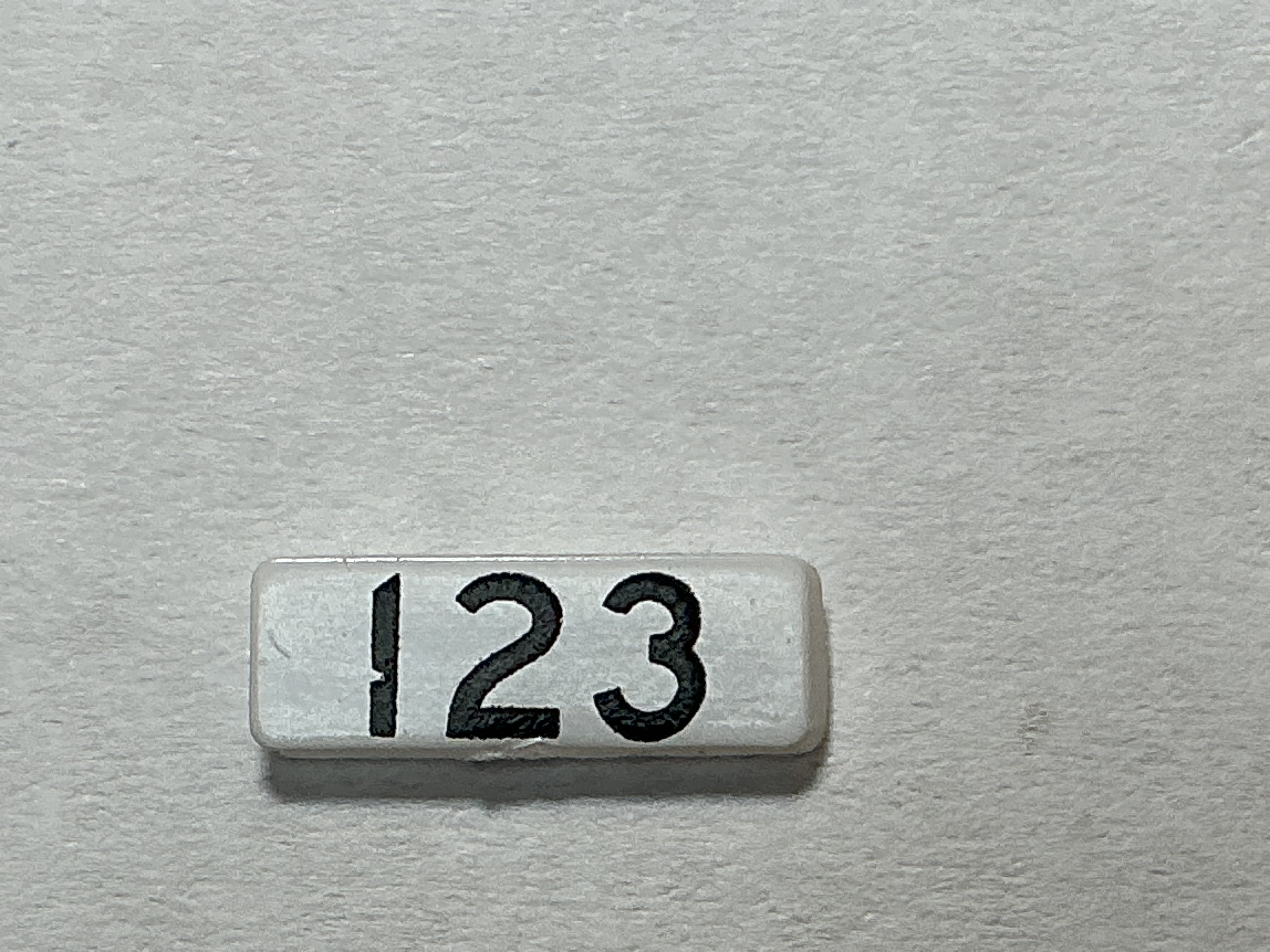 NUMBER BOARD / RH OR LH / FRONT OR REAR / #123 / PREMIER GP-40