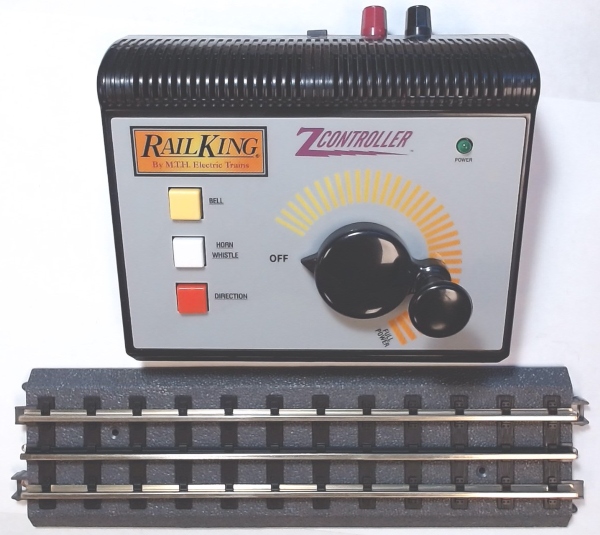 REALTRAX / 8) O-31 CURVES & 4) 10" STRAIGHTS / 1)40-1000 TRANSFORMER & CONTOLLER / 1) LOCK-ON / NEW OLD STOCK