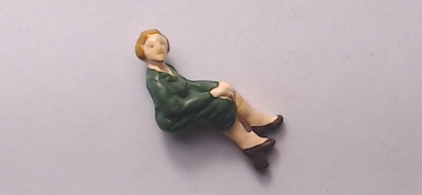 FIGURE / SITTING WOMAN / GREEN DRESS & BLONDE HAIR / RAILKING OPERATING STATION PLATFORM