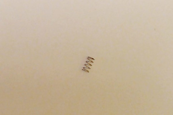 SPRING / COIL / NICKEL / TRUCK SIDE DETAIL / 2.5mm D x 5mm L x 0.2mm THICK