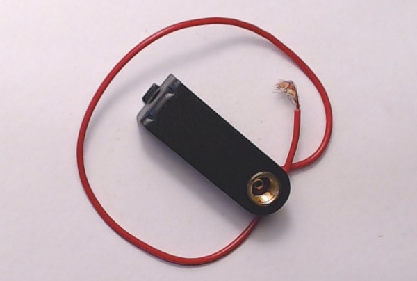 BRACKET / HEADLIGHT / STAMPED METAL / L-SHAPED / MINIATURE SCREW BASE SOCKET / 11.36mm W x 33.5mm L x 7.9mm STEP / RAILKING FA-2